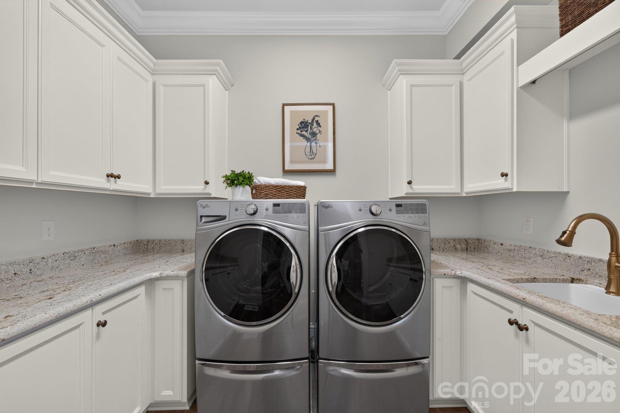 Laundry room off kitchen & drop zone area - 7805 Clovervale Drive, Waxhaw
