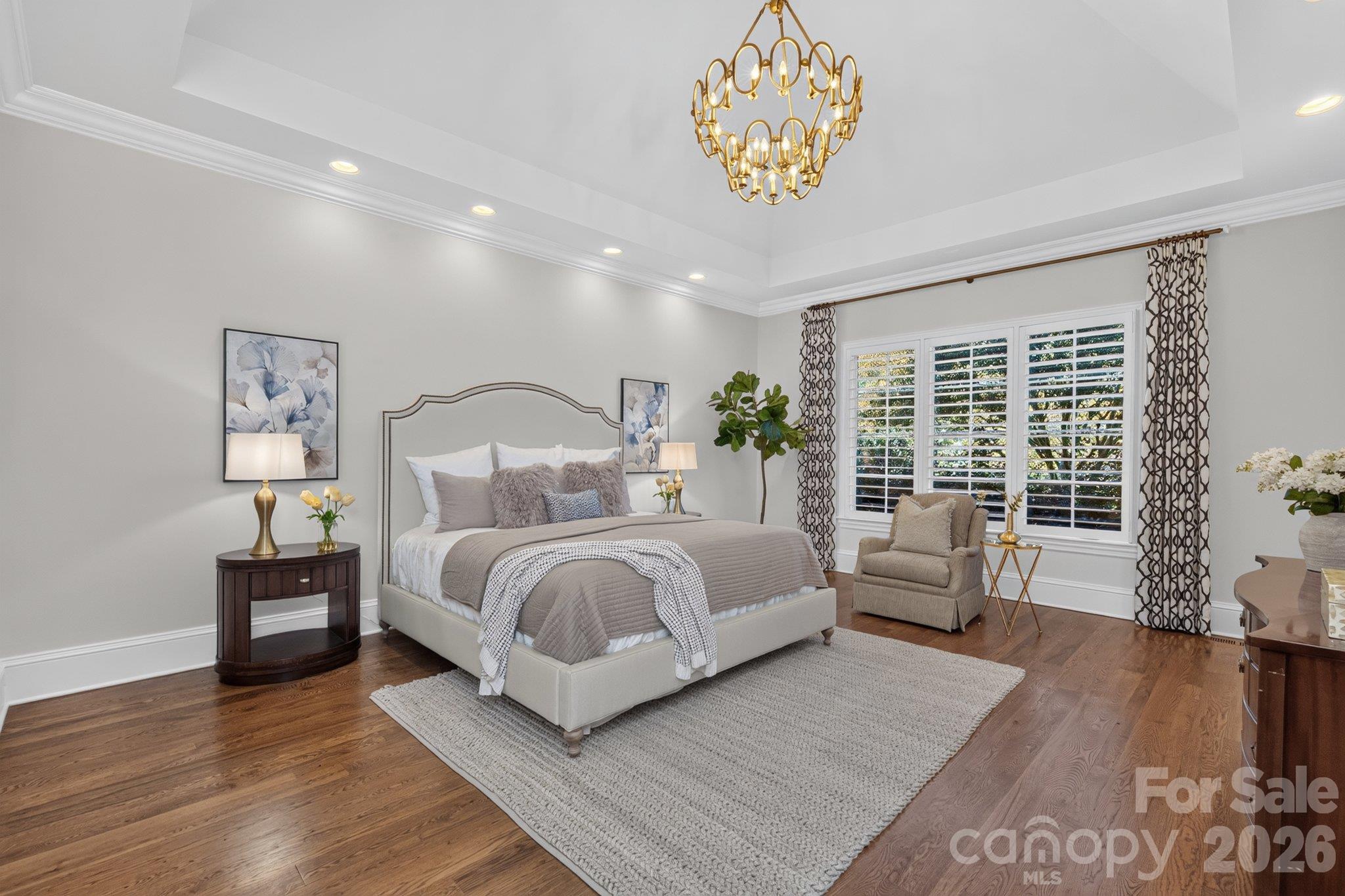 Main level primary suite w/plantation shutters - 7805 Clovervale Drive, Waxhaw