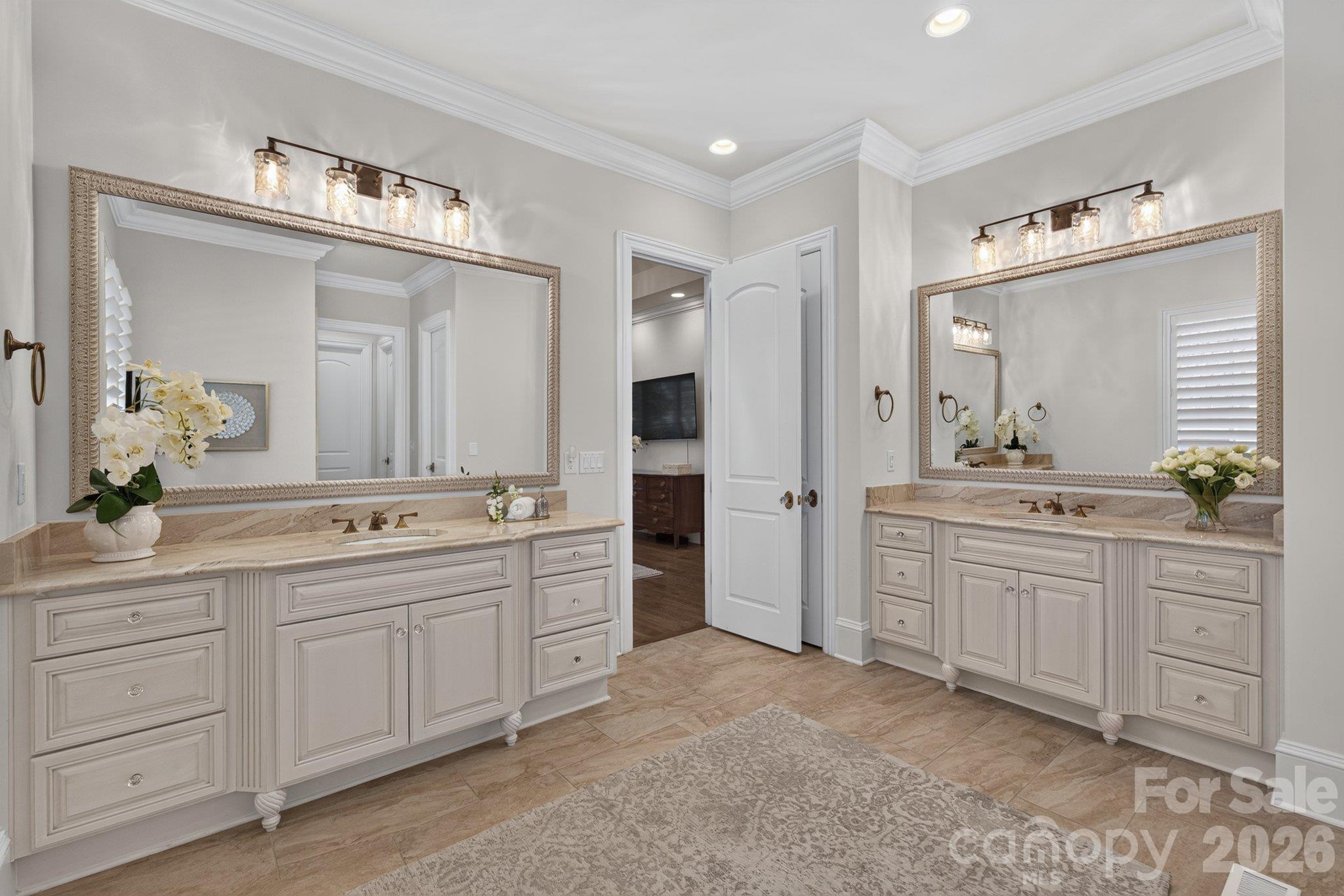 Large primary bath with large separate vanities. - 7805 Clovervale Drive, Waxhaw