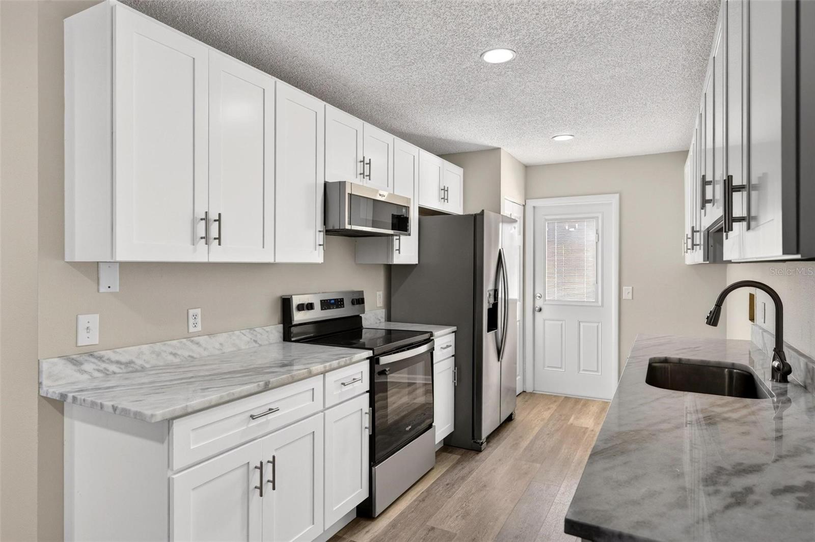 Townhouse at 459 W ROSEWOOD LN, TAVARES, photo 5 of 52
