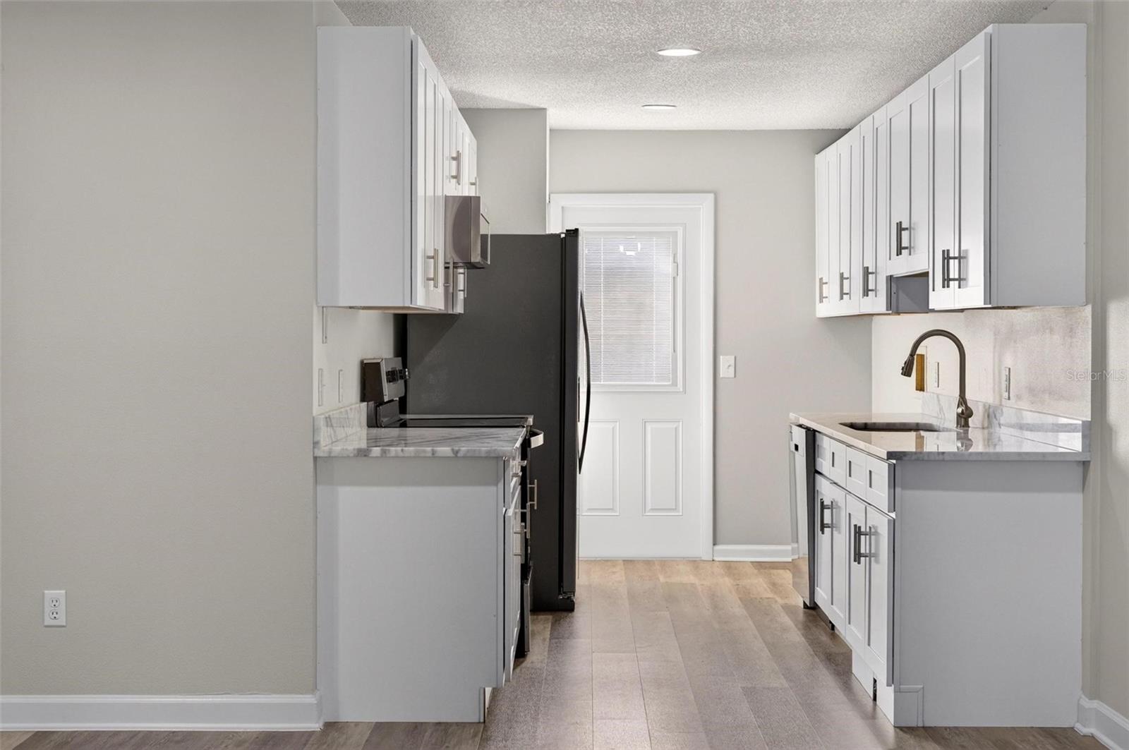 Townhouse at 459 W ROSEWOOD LN, TAVARES, photo 14 of 52