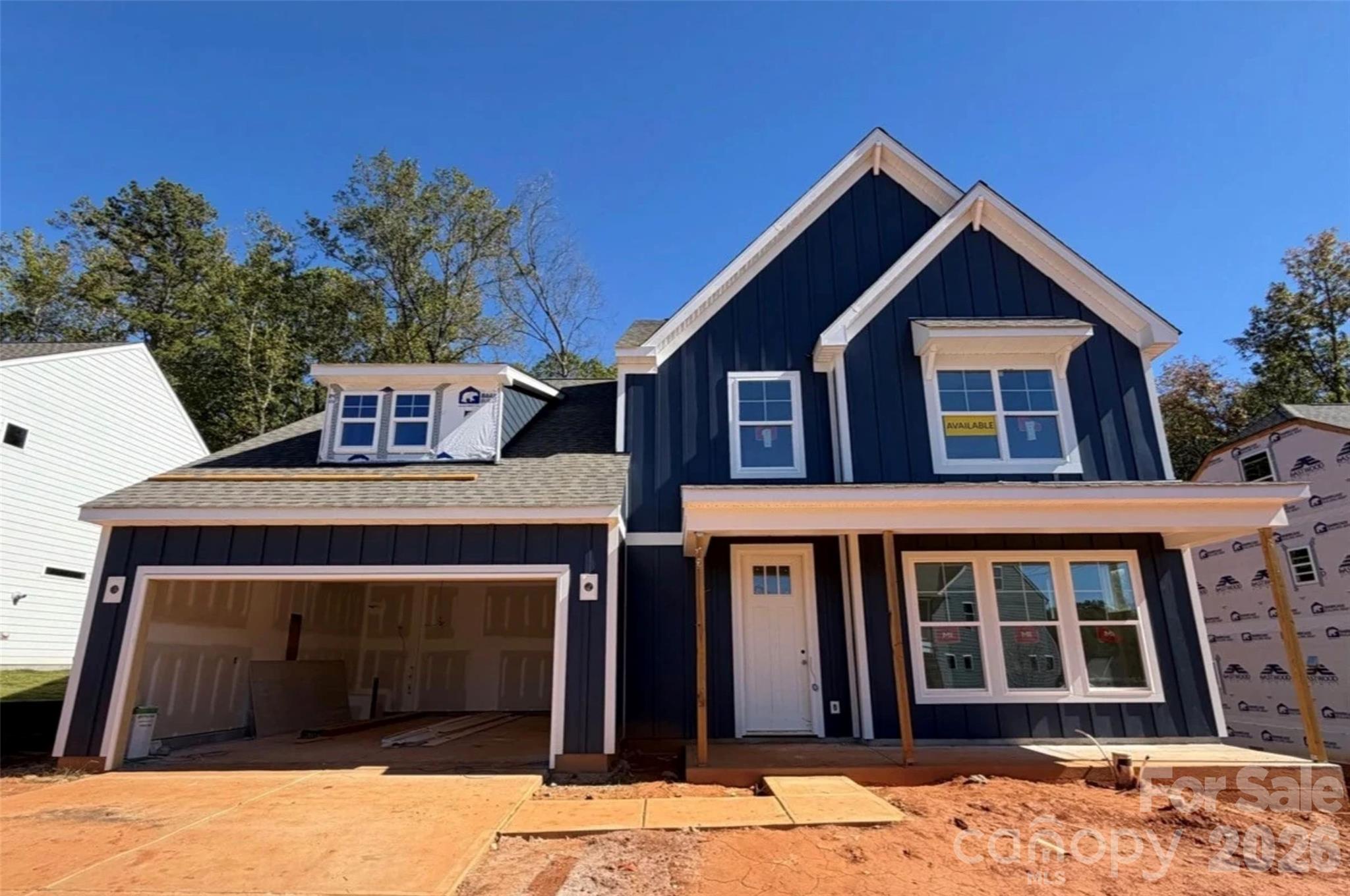 Homesite 92 features a Brevard E floorplan - 6100 New River Drive, Huntersville