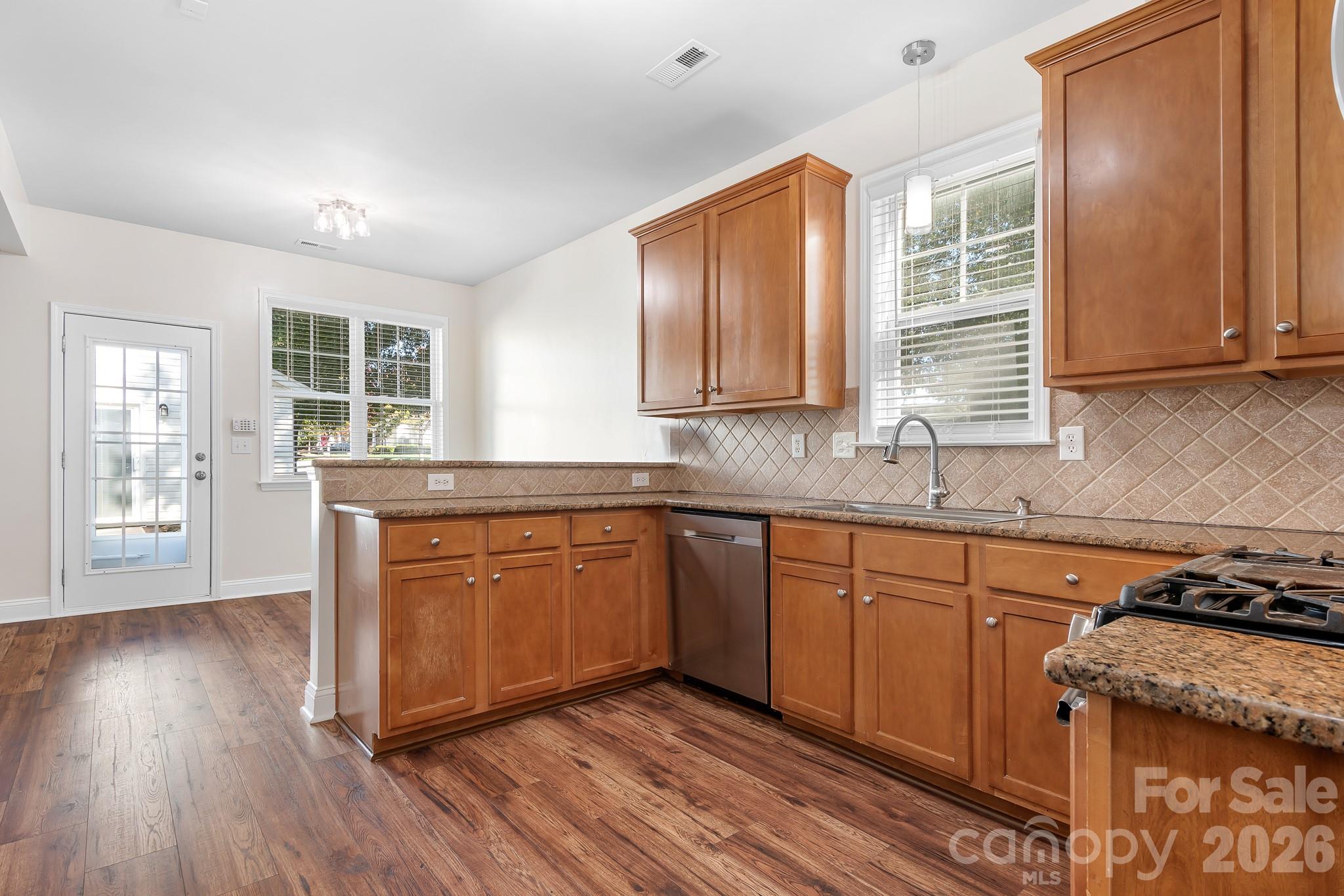 Kitchen - Open Bar to Dinette and Patio View- Great for Entertaining - 15404 Crossing Gate Drive, Cornelius
