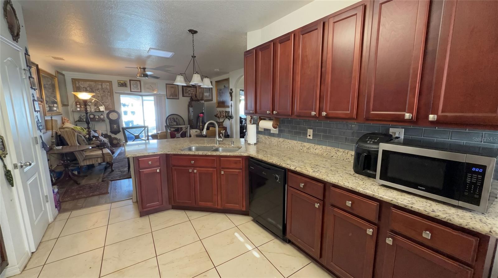 AI enchanted photo. Clutter digitally removed for presentation purposes. - 1819 VAN GOGH DR, AUBURNDALE