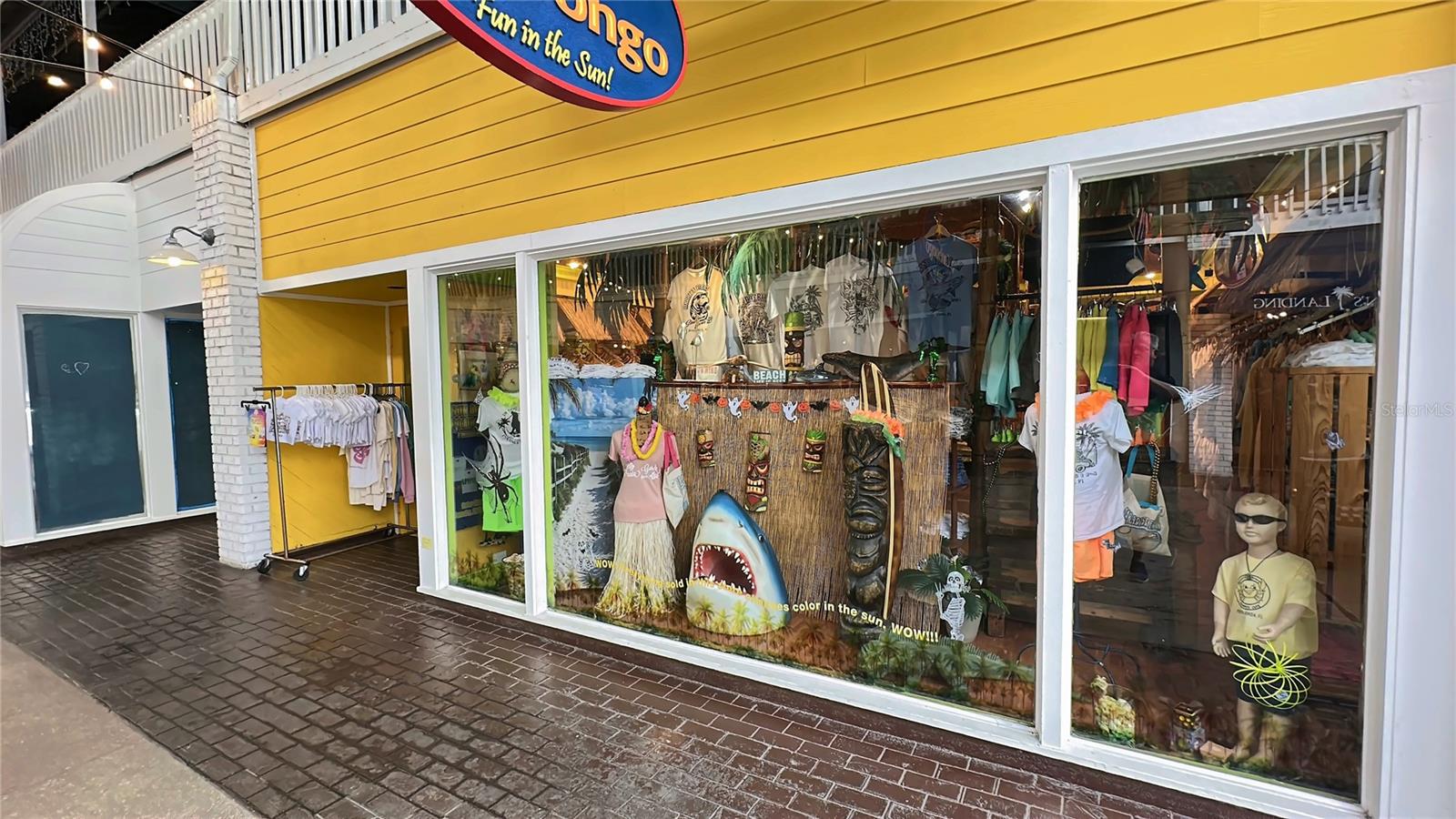 Shopping at Fisherman's Village in Punta Gorda, with boutiques and gift shops along the covered waterfront walkway. - 1423 MEDITERRANEAN DR #B, PUNTA GORDA