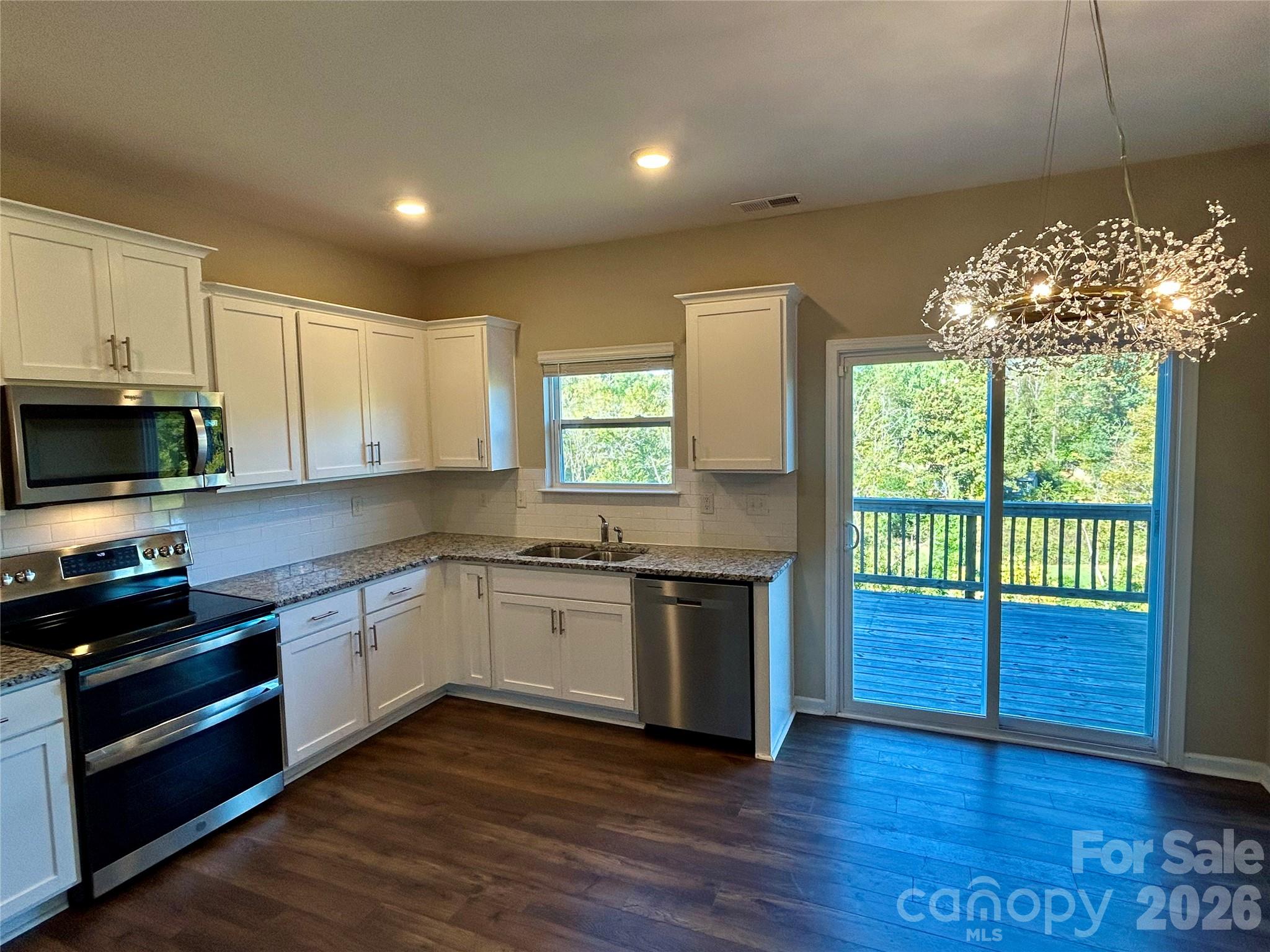 Kitchen onto Balcony - 182 Marathon Lane, Candler