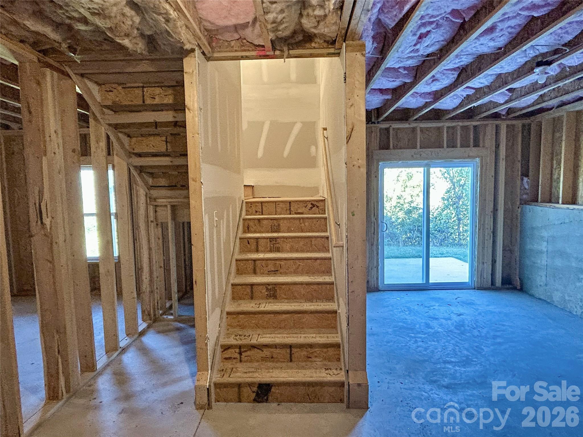 Unfinished basement with slider to lower patio - 182 Marathon Lane, Candler
