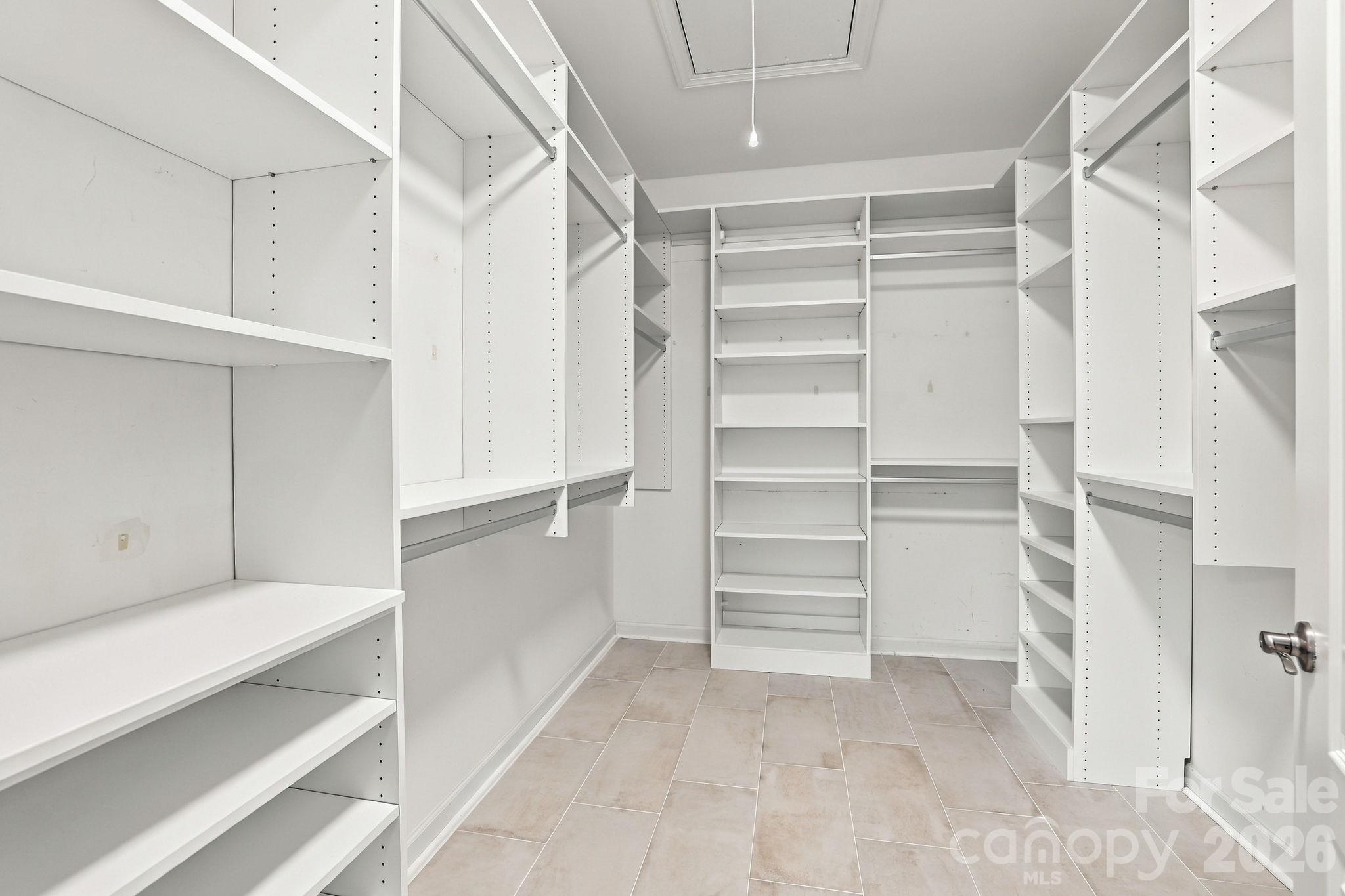 Primary closet with cusotm shelving - 3103 Arches Bluff Circle, Lancaster