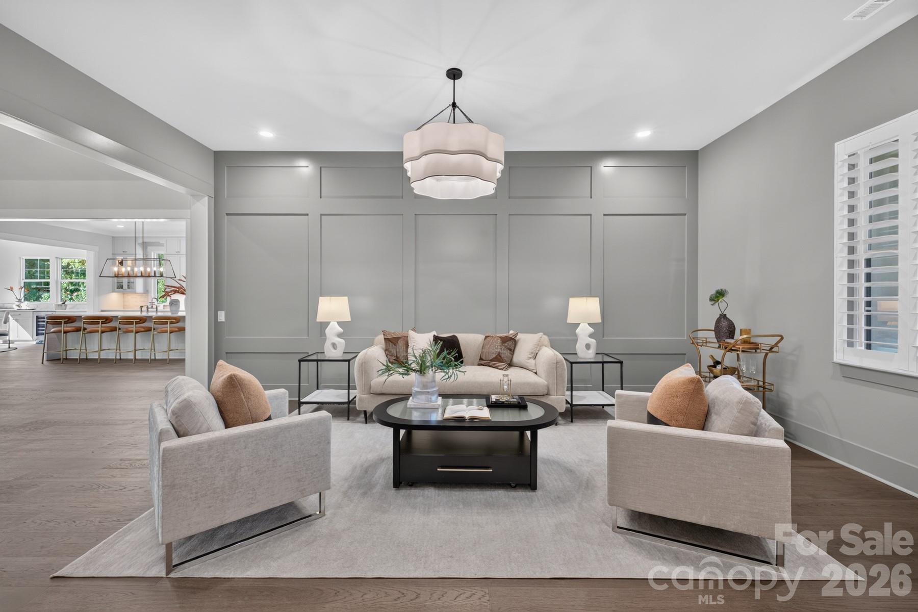 Style the Salon as a formal living, library, office/study, music room, etc. - 128 Willow View Loop, Davidson