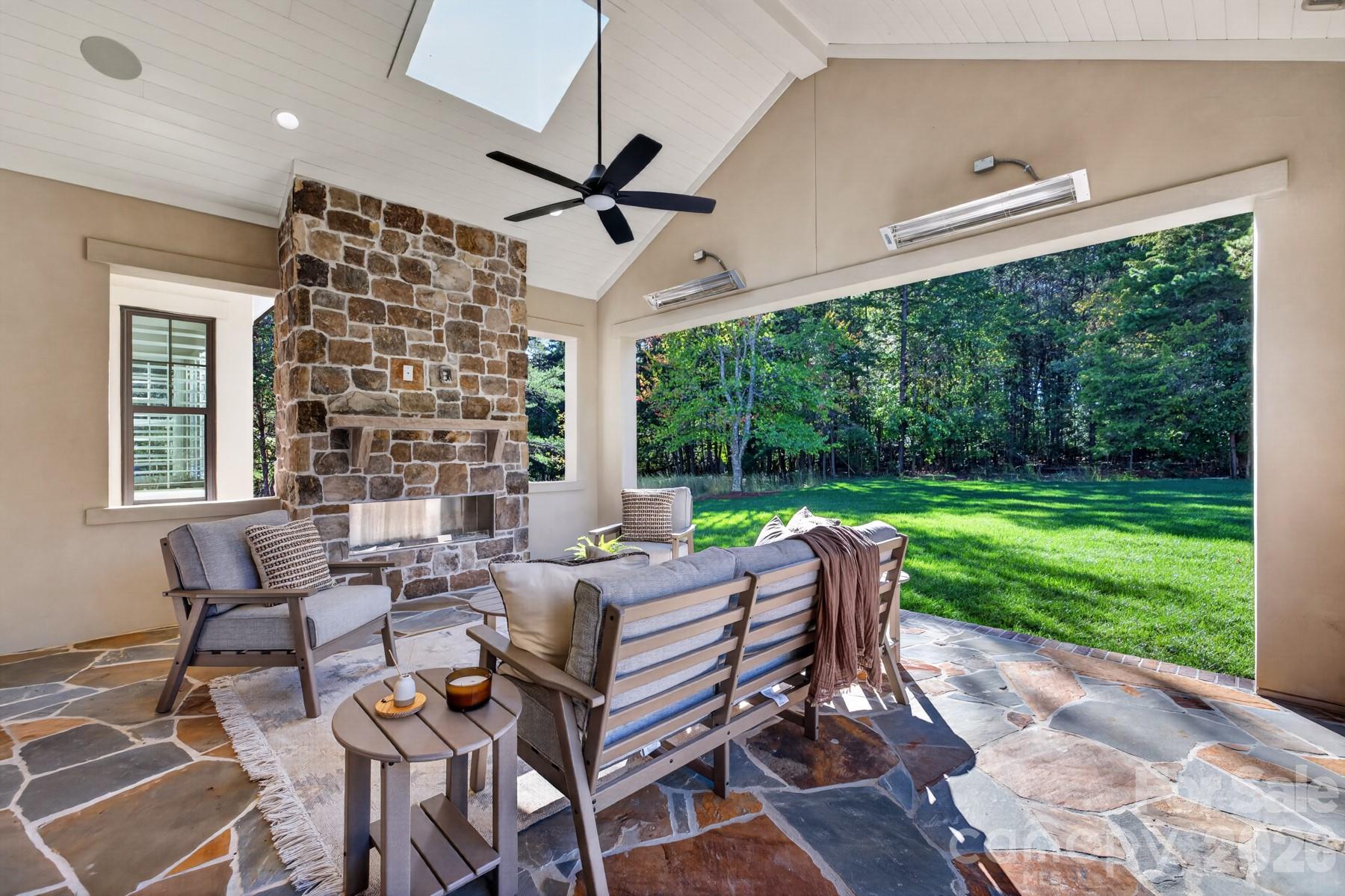 Stonework on the fireplace and flooring - 128 Willow View Loop, Davidson