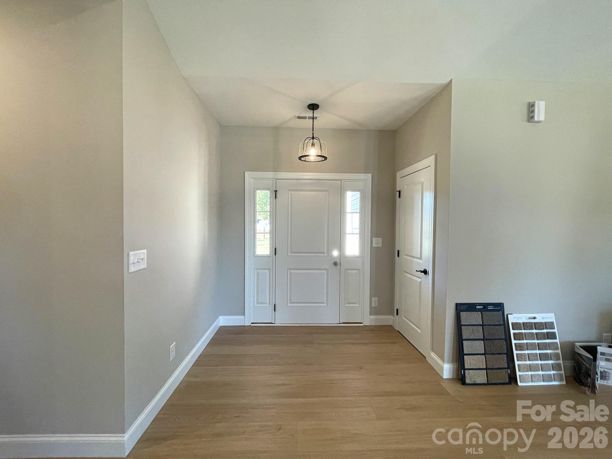 Entrance Foyer with Coat Closet - 130 Windstone Crossing Trail, Troutman
