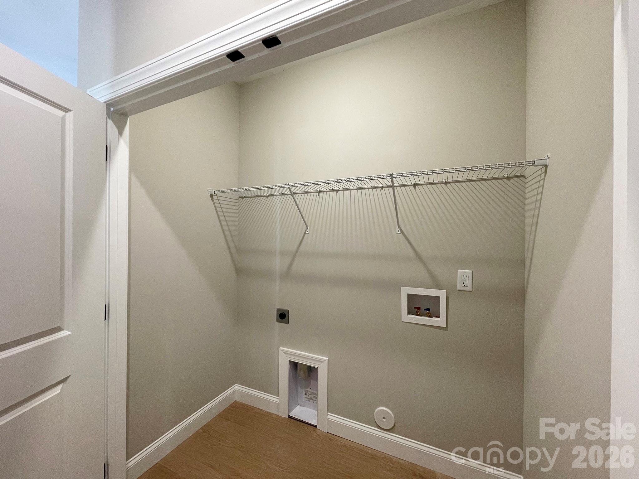 Laundry Closet off Hallway - 130 Windstone Crossing Trail, Troutman