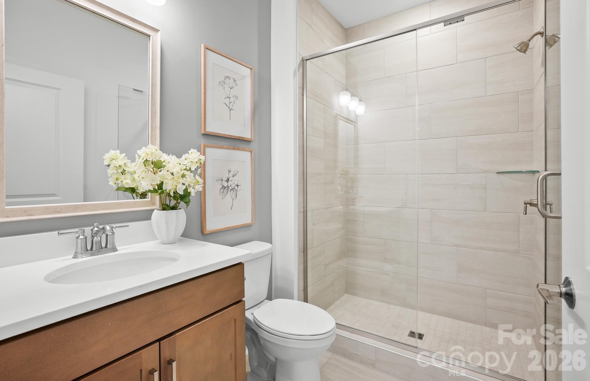 Hall bath.  For representative purposes - 3022 Topaz River Road, Waxhaw