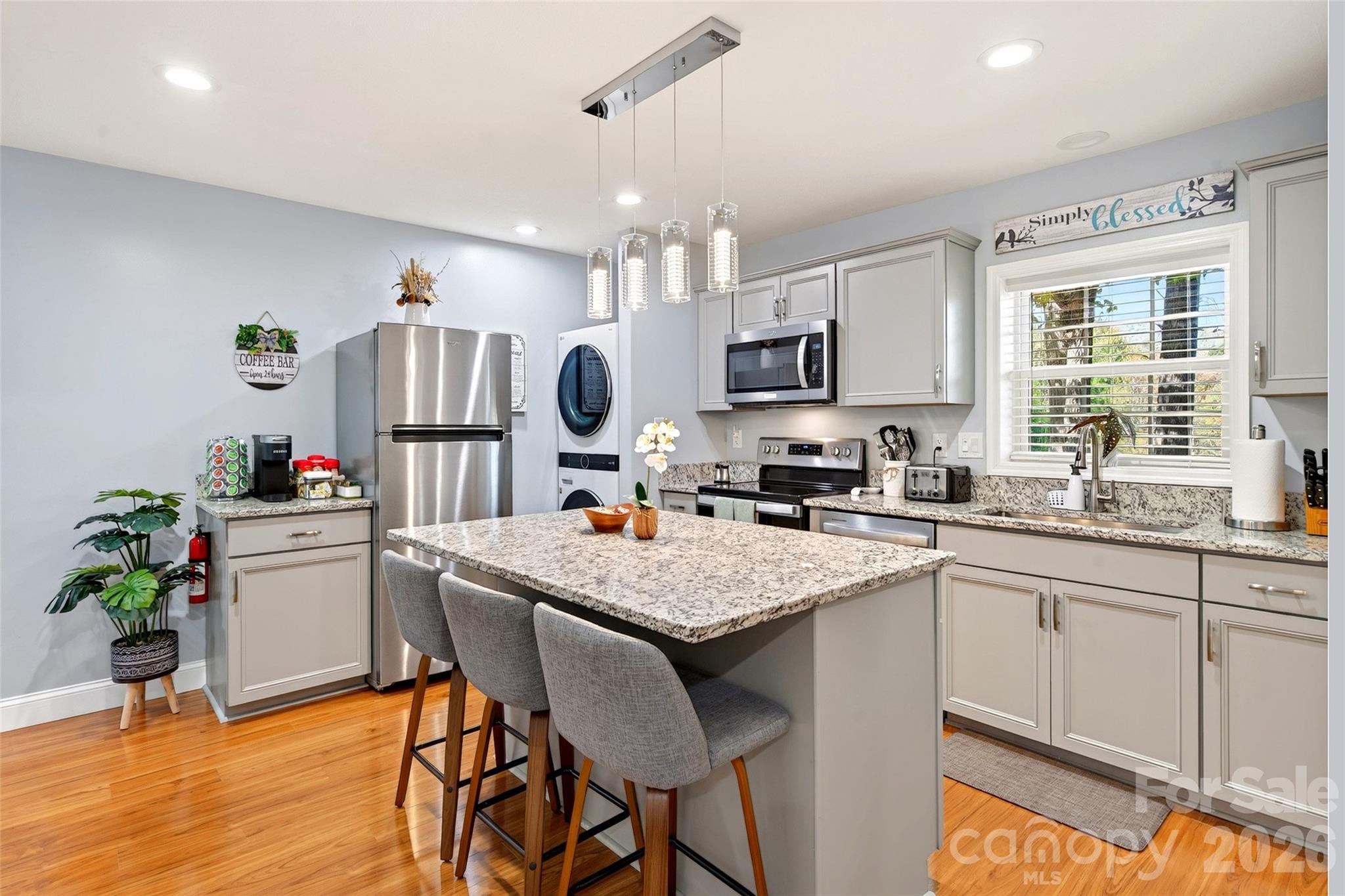 Cottage kitchen with stackable laundry - 337 & 345 Avery Creek Road, Arden