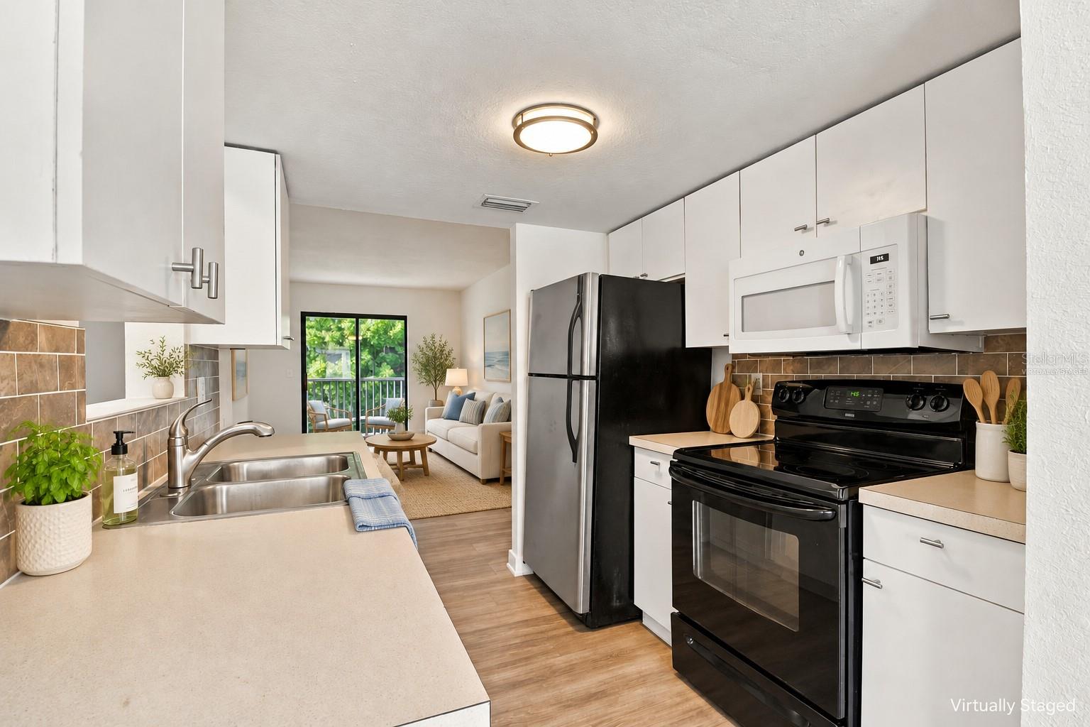 Virtually staged kitchen - 5310 26TH ST W #1506, BRADENTON