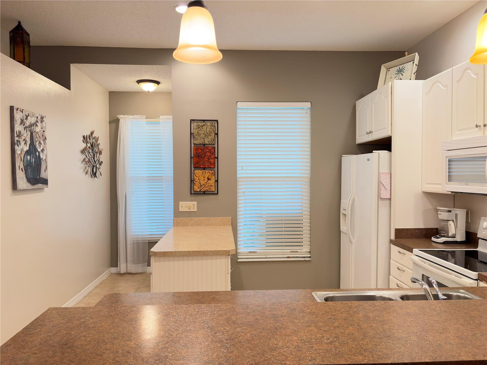 entrance and kitchen - 311 KELSEY WAY #3, SUN CITY CENTER
