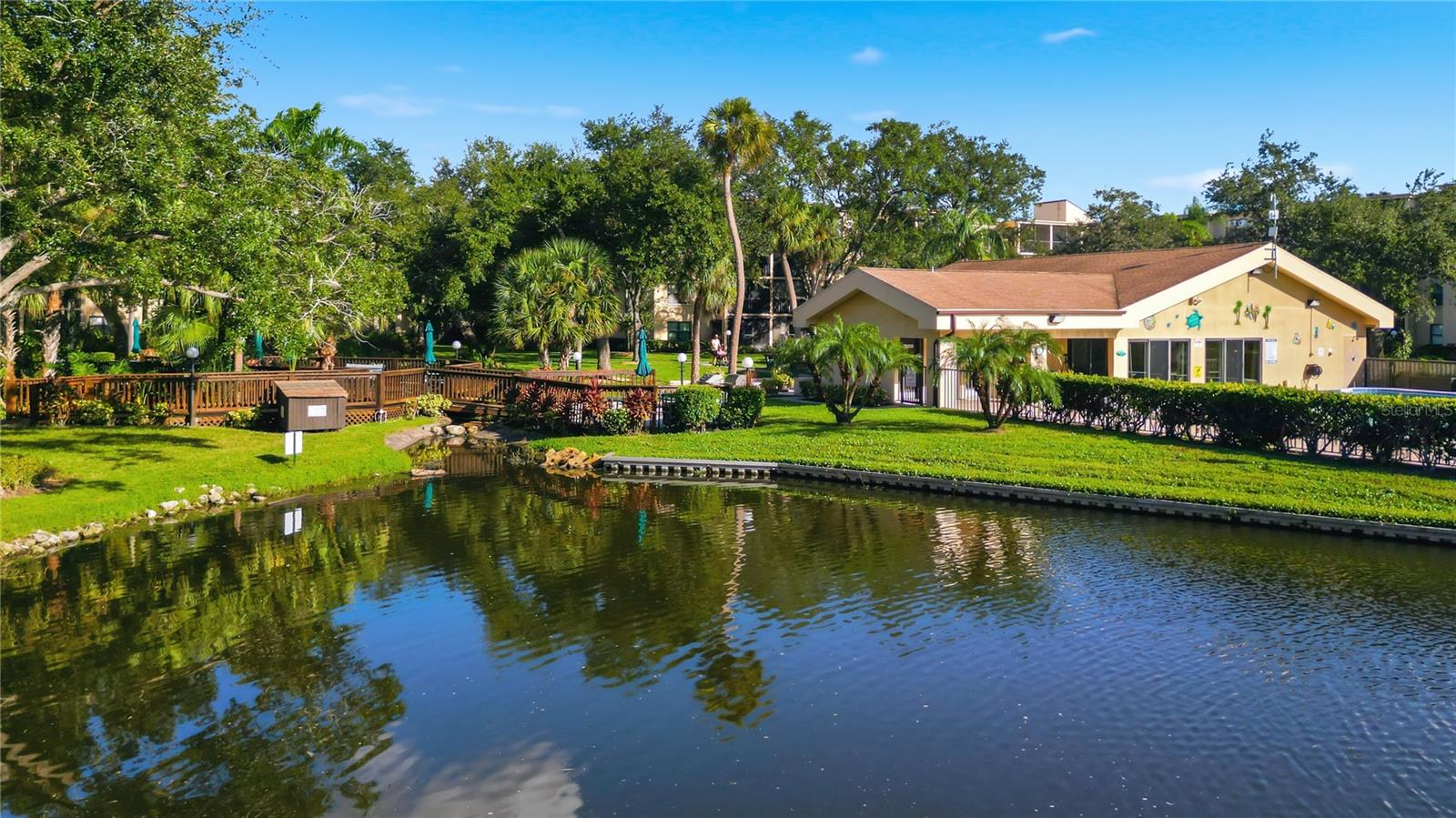 Pond Overlooking Clubhouse and Pool - 625 30TH AVE W #G204, BRADENTON