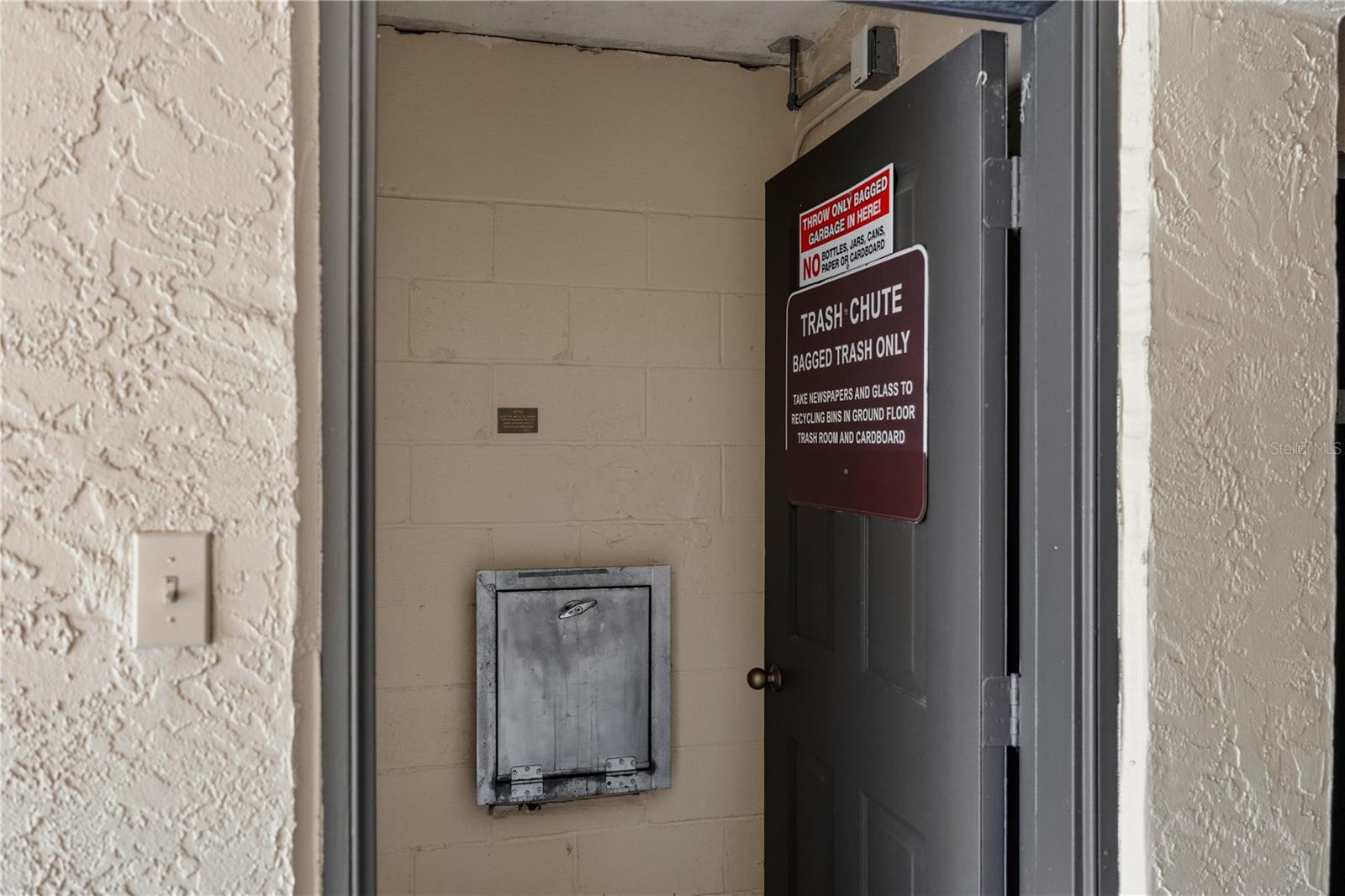 Convenient Trash Shoot, Just Outside Storage Unit - 625 30TH AVE W #G204, BRADENTON