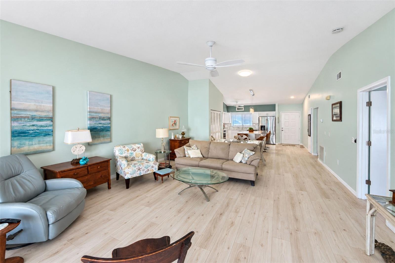 The cathedral ceiling creates a spacious feeling & the tubular skylight provides additional natural light! - 6468 HAMLET DR #B, ENGLEWOOD
