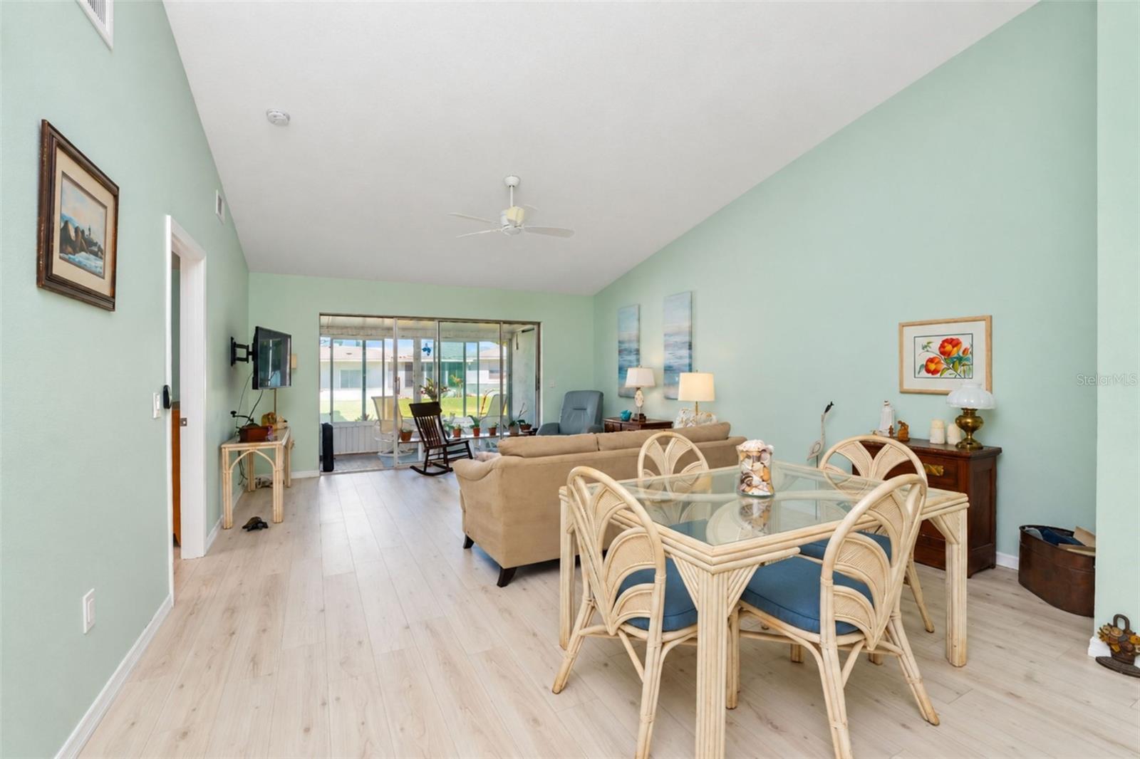 The dining area is conveniently located between the kitchen and living room. - 6468 HAMLET DR #B, ENGLEWOOD