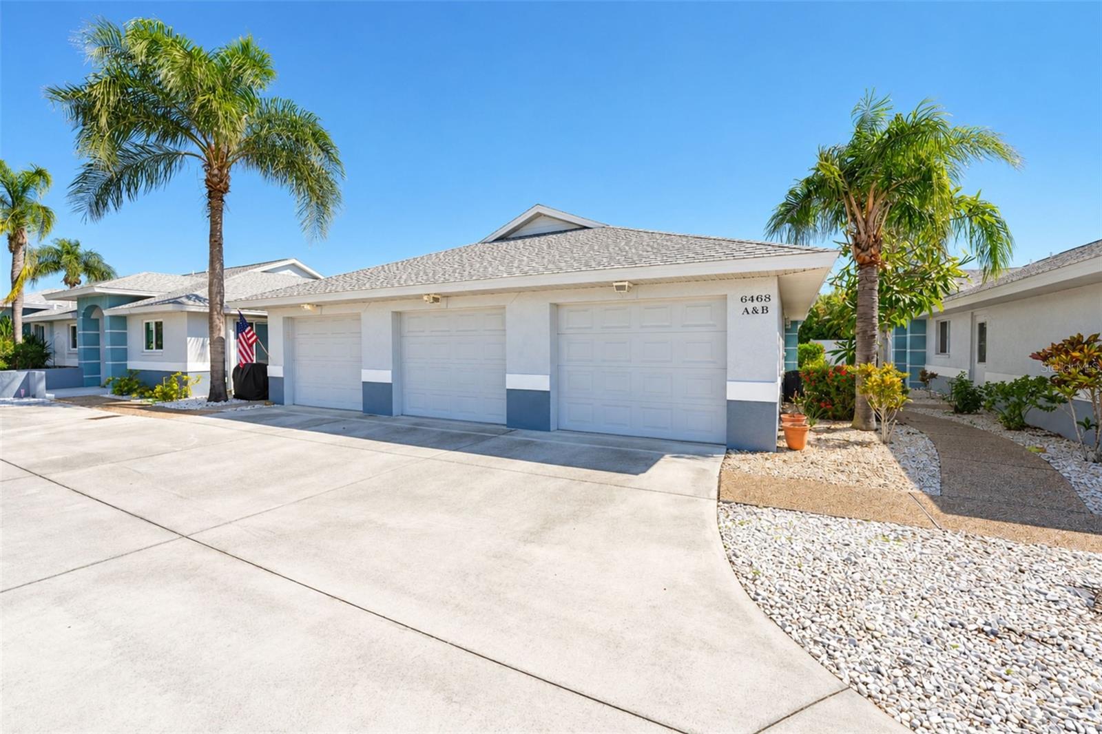The walkway from the garage/parking area to your new condo! - 6468 HAMLET DR #B, ENGLEWOOD