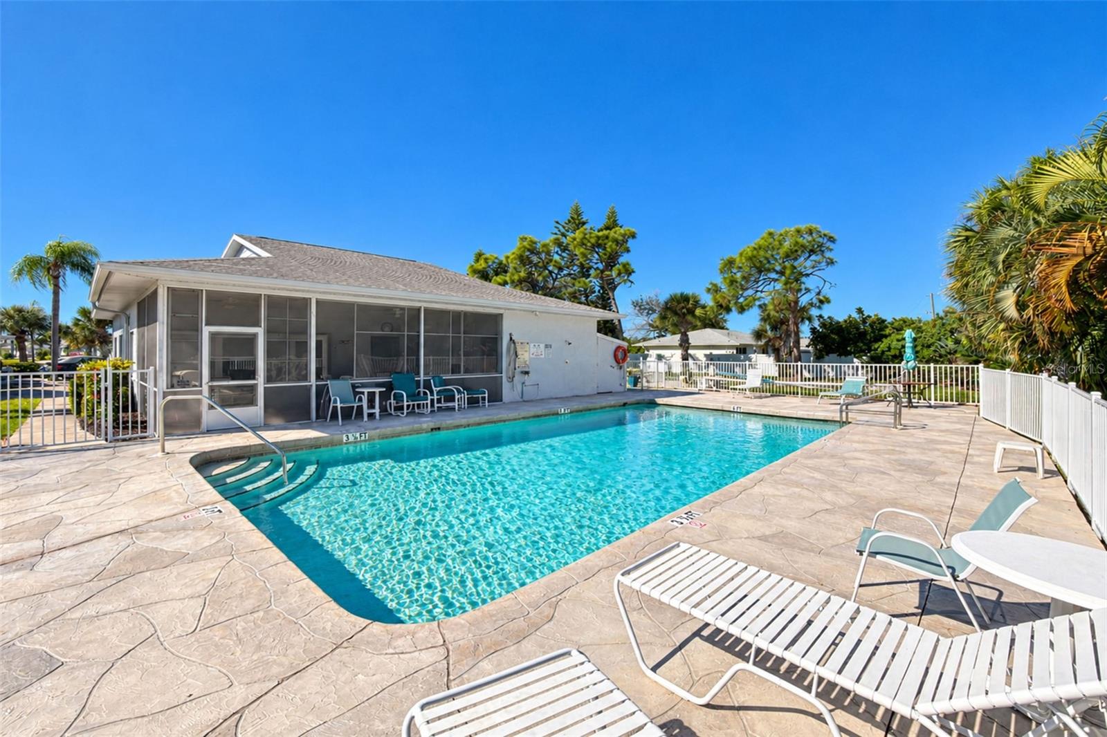 Plenty of room to gather around the pool! - 6468 HAMLET DR #B, ENGLEWOOD