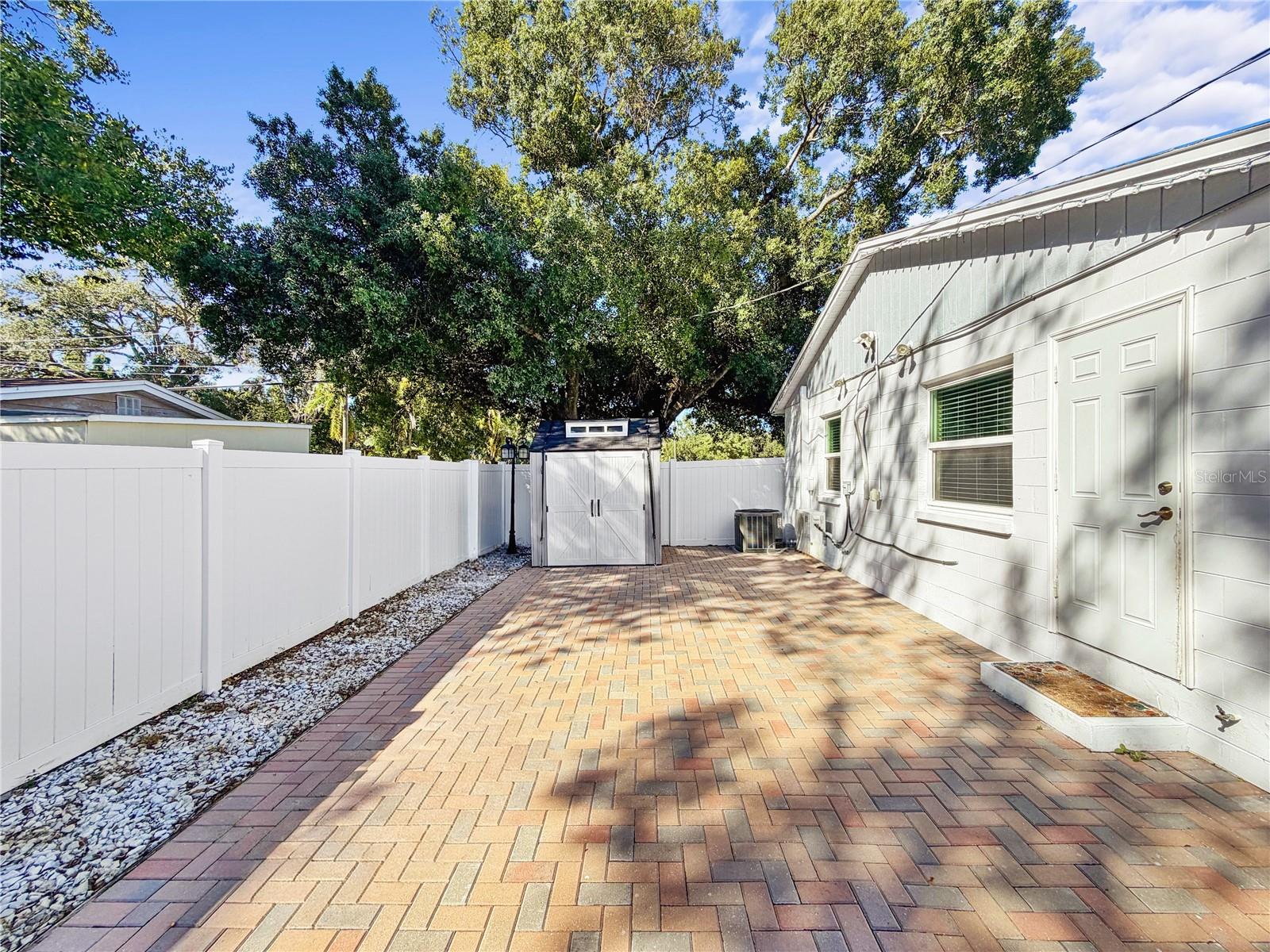 Back paver patio with shed - 6819 S DESOTO ST, TAMPA