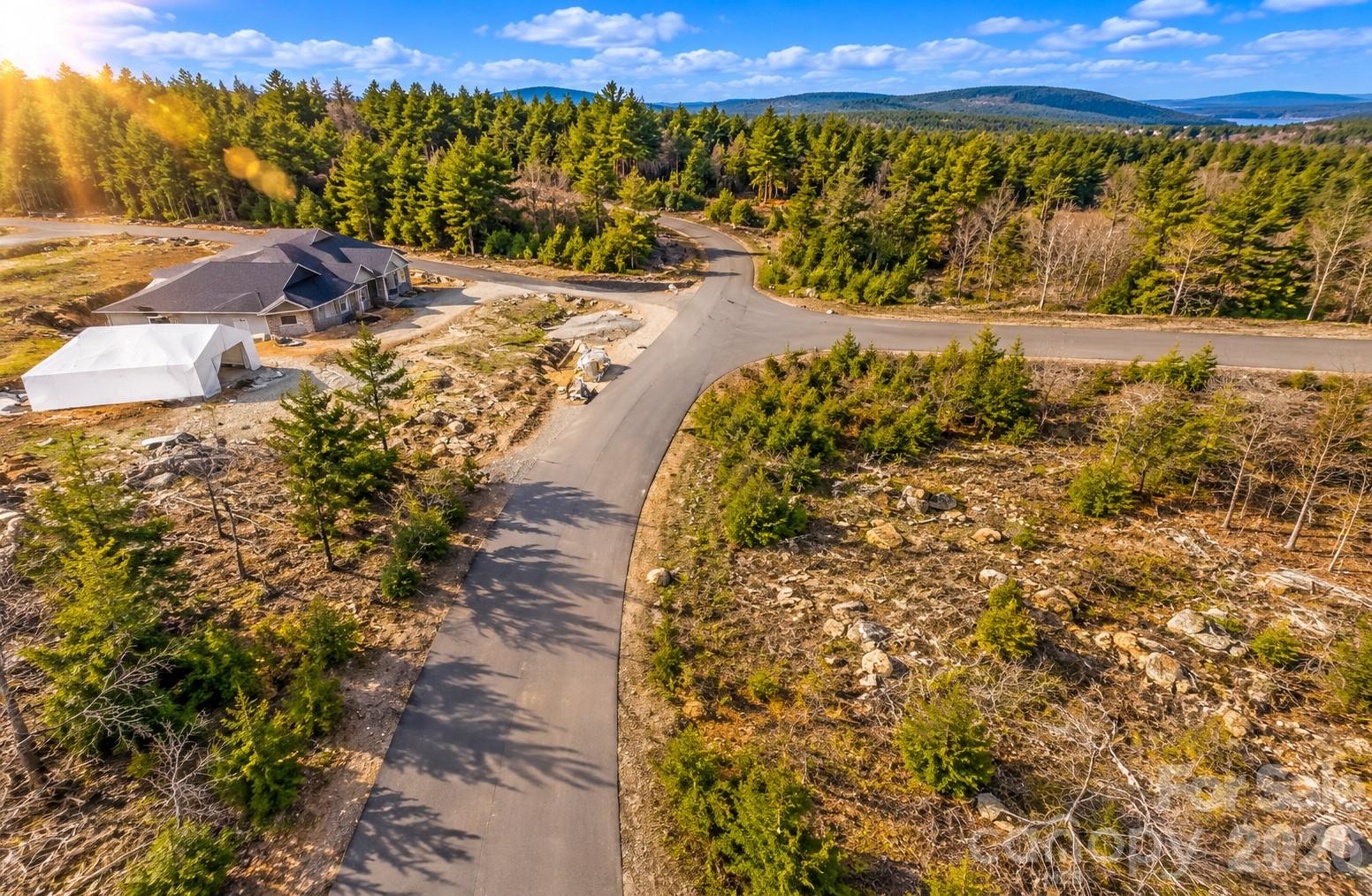 Aerial of homes and roads in The Springs at High Rock. - 268 Lot43 Sirocco Drive W, Denton