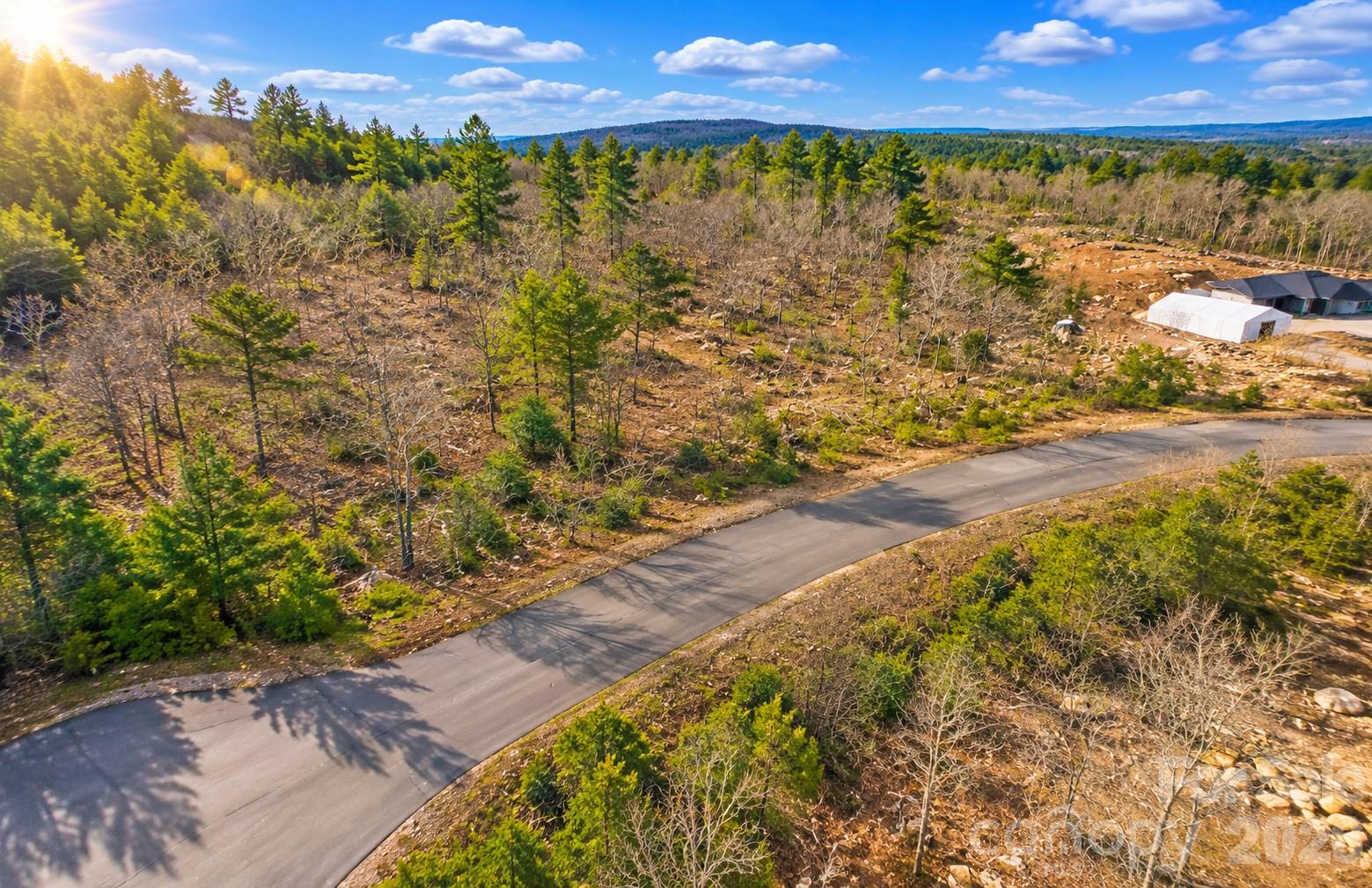 Aerial of the community roads and wooded lots nearby. - 268 Lot43 Sirocco Drive W, Denton