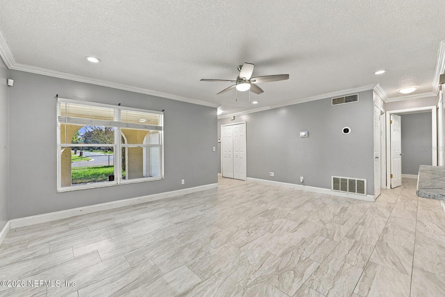 Living Area and Dining Area - 6054 TOYOTA DR, JACKSONVILLE