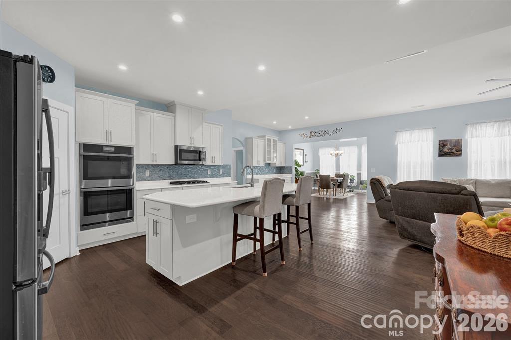 Staged photo; property rents unfurnished. - 11216 Vanguard Parkway, Huntersville