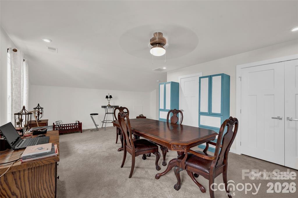 Staged photo; property rents unfurnished. - 11216 Vanguard Parkway, Huntersville