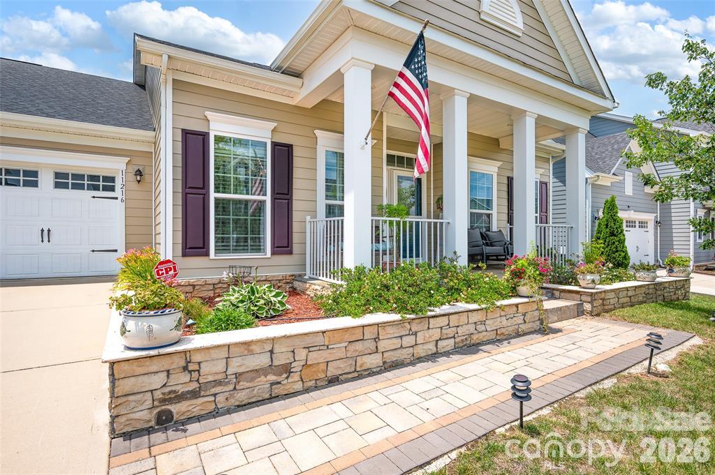 Staged photo; property rents unfurnished. - 11216 Vanguard Parkway, Huntersville