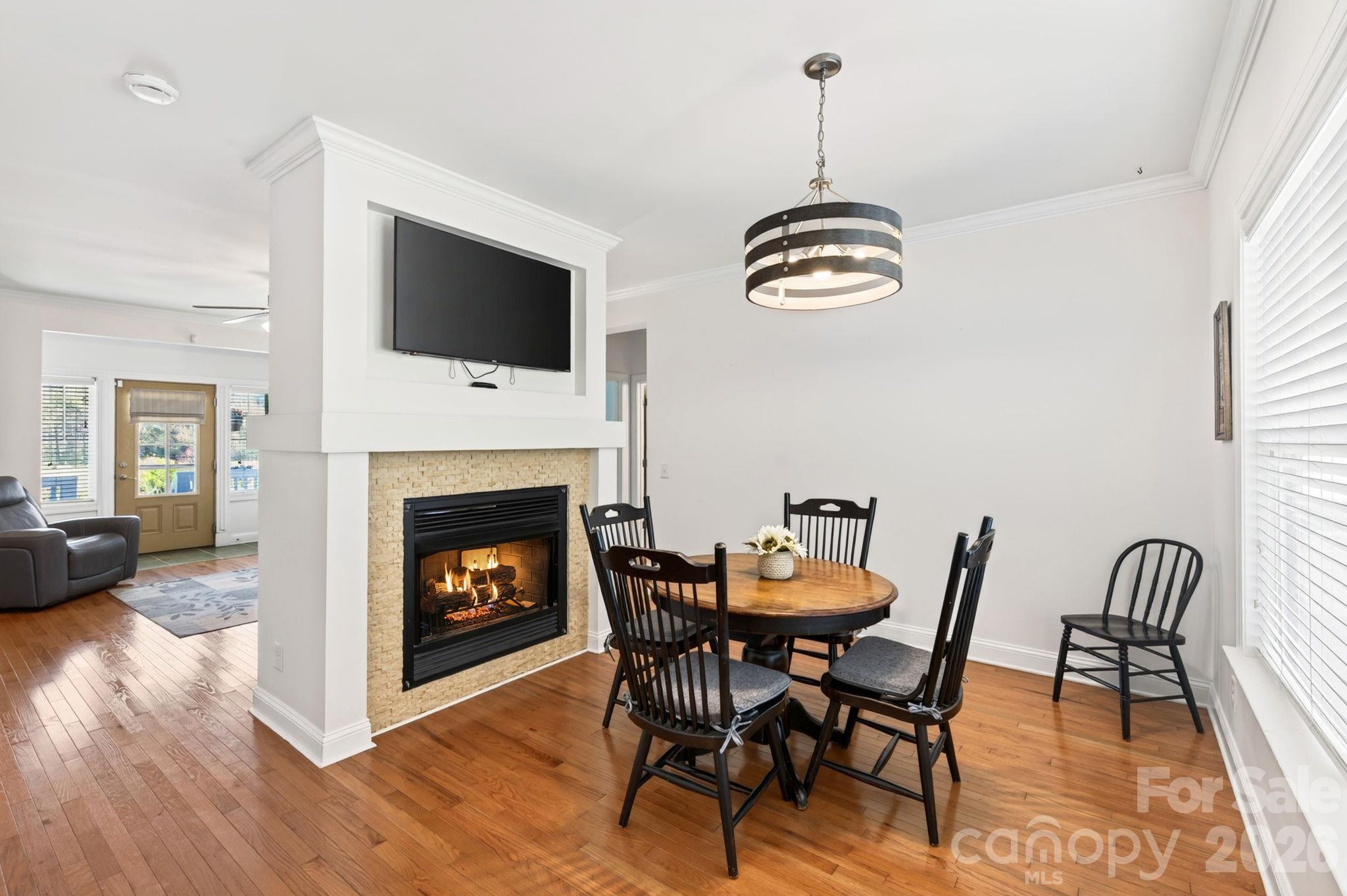 Dining room with gas fireplace - 10 Hominy Meadows Drive, Candler