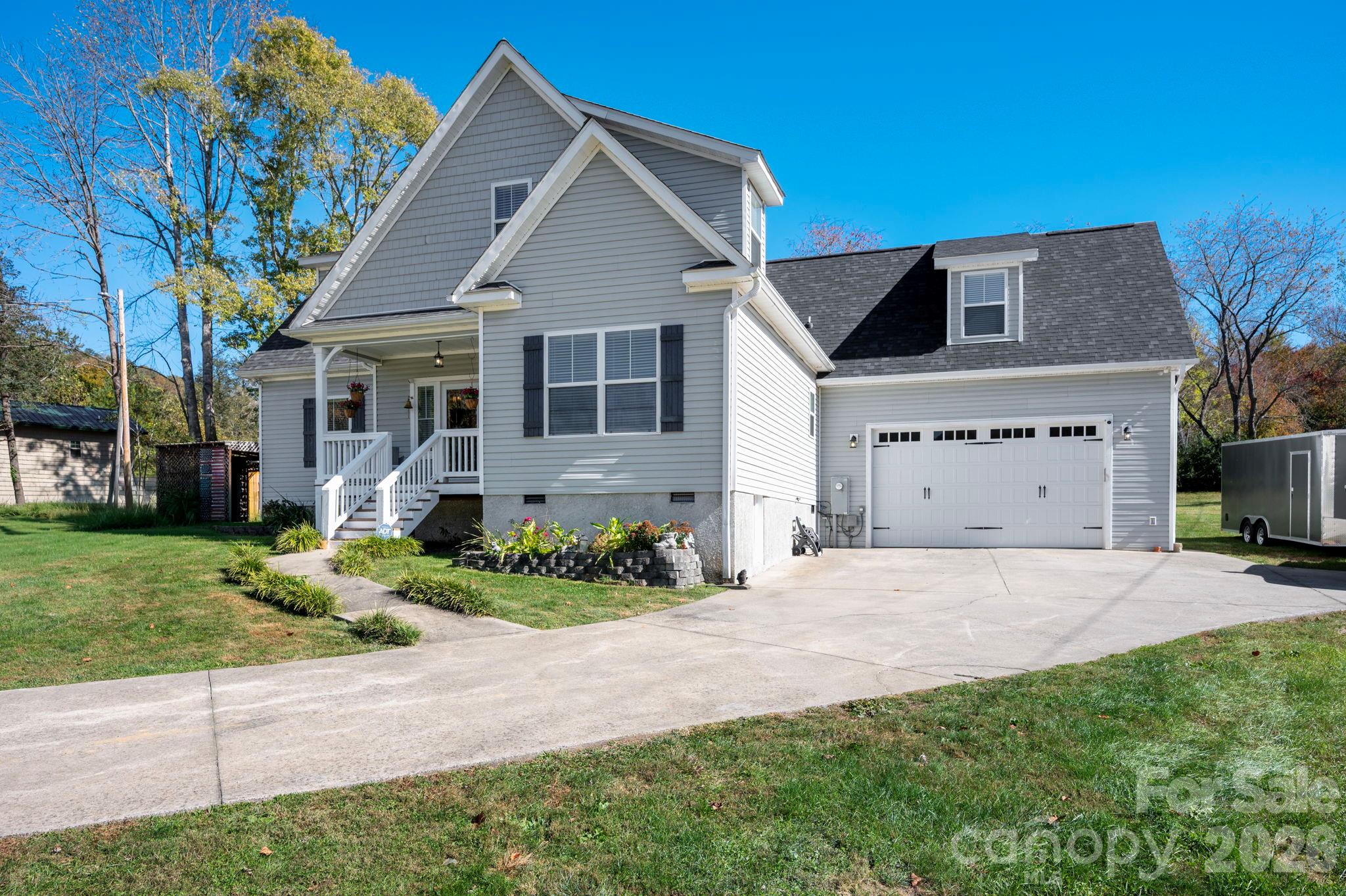 Tons of parking in the garage and on the concrete driveway - 10 Hominy Meadows Drive, Candler