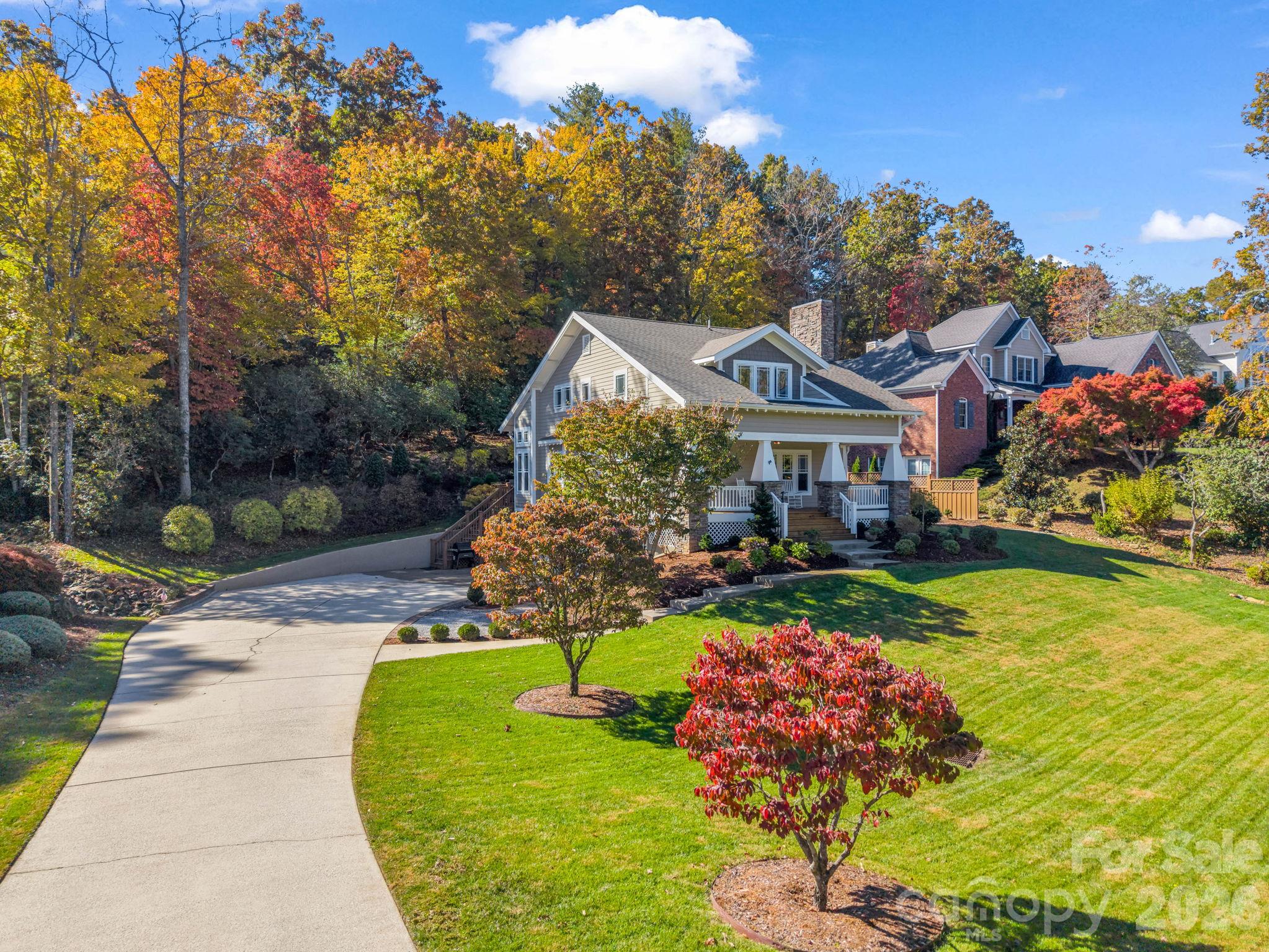 Concrete drive to left of the home - 376 Scarlet Tanager Court, Arden