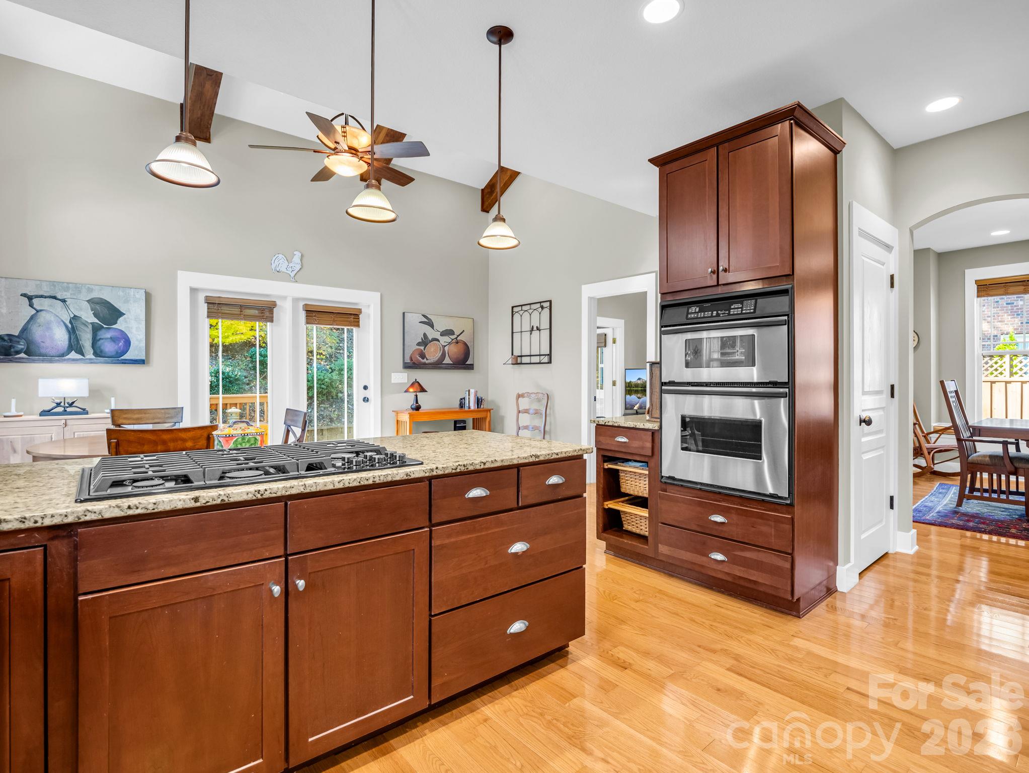 Inside of kitchen looking to rear of the home - 376 Scarlet Tanager Court, Arden