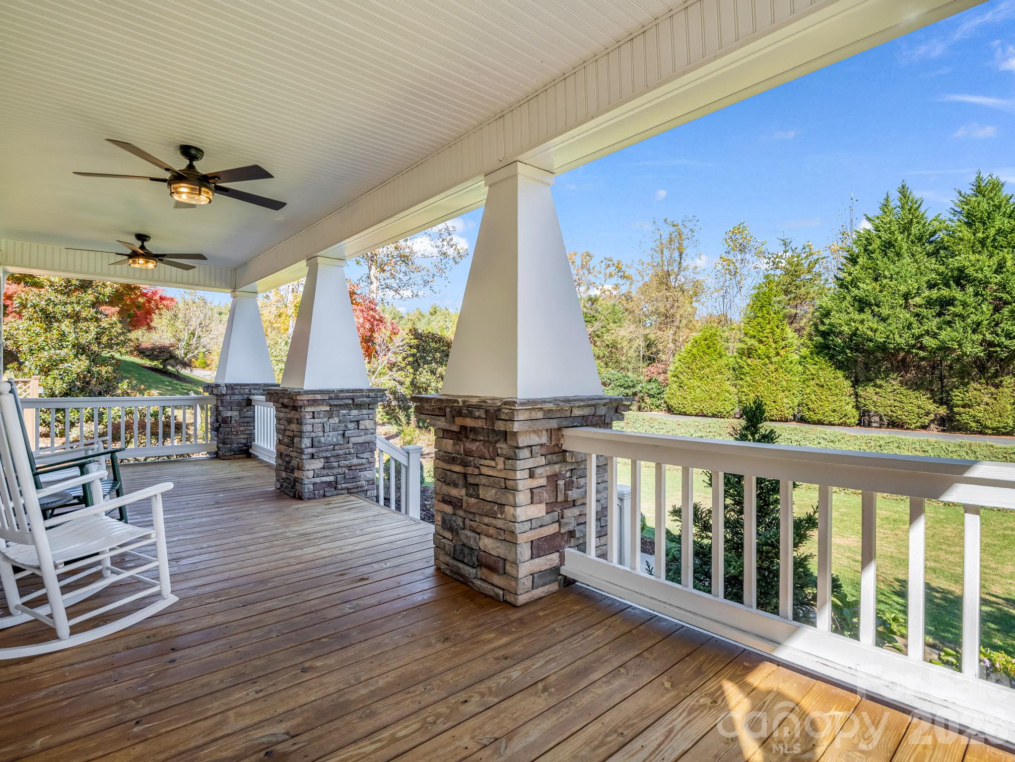 Covered front porch with 2 fans - 376 Scarlet Tanager Court, Arden