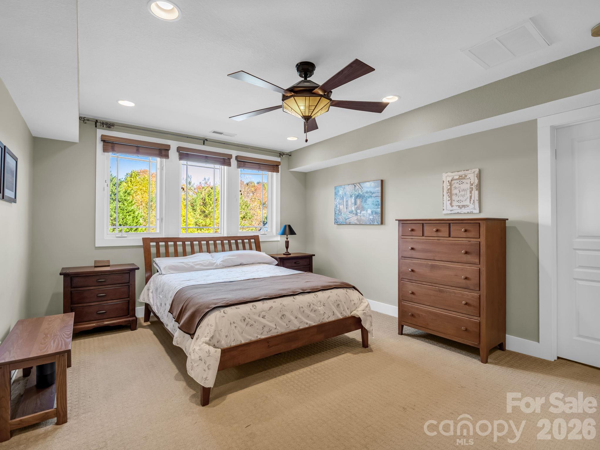 Primary bedroom offers 2 walk-in closets - 376 Scarlet Tanager Court, Arden