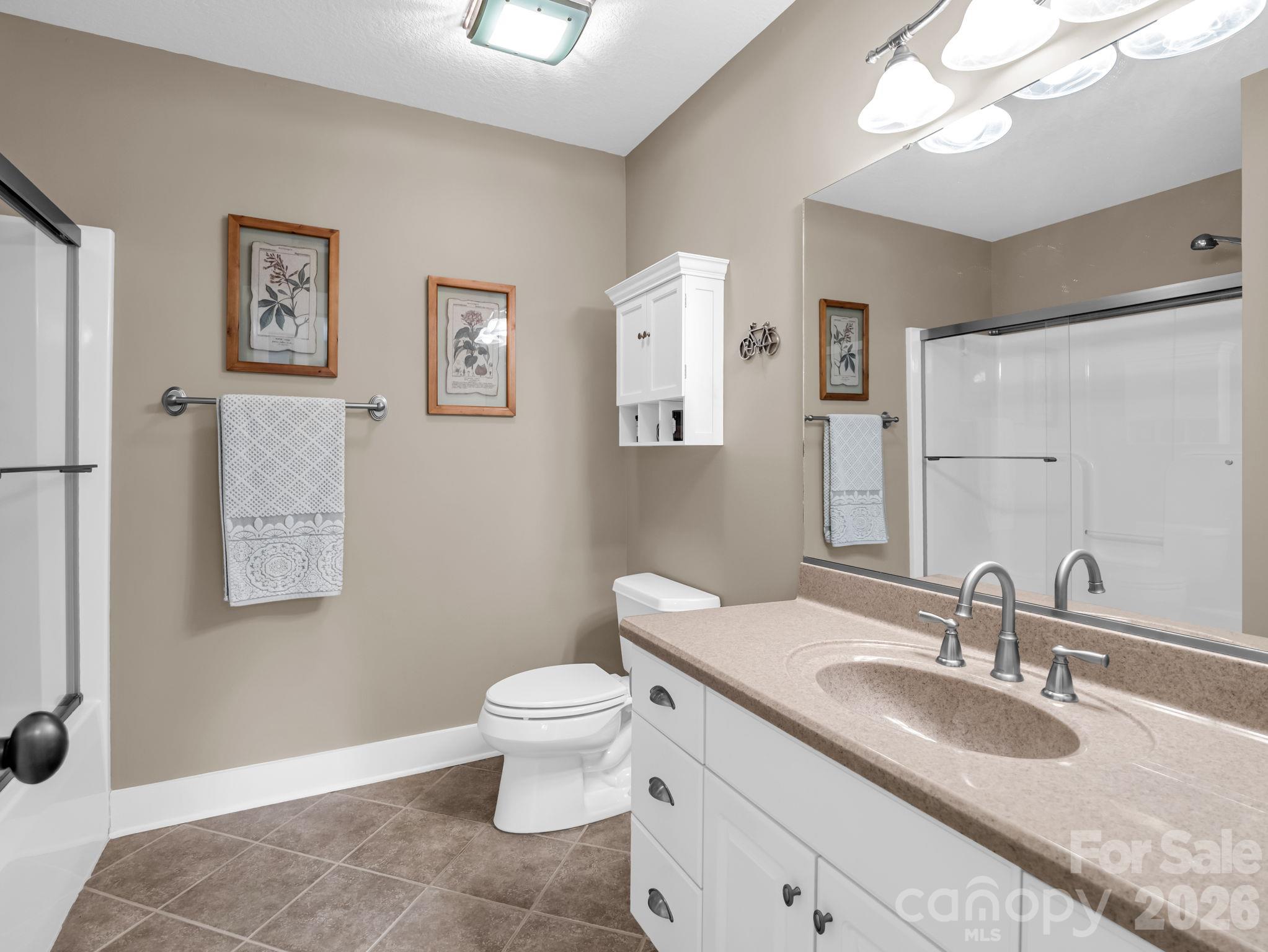 2nd bathroom - 376 Scarlet Tanager Court, Arden