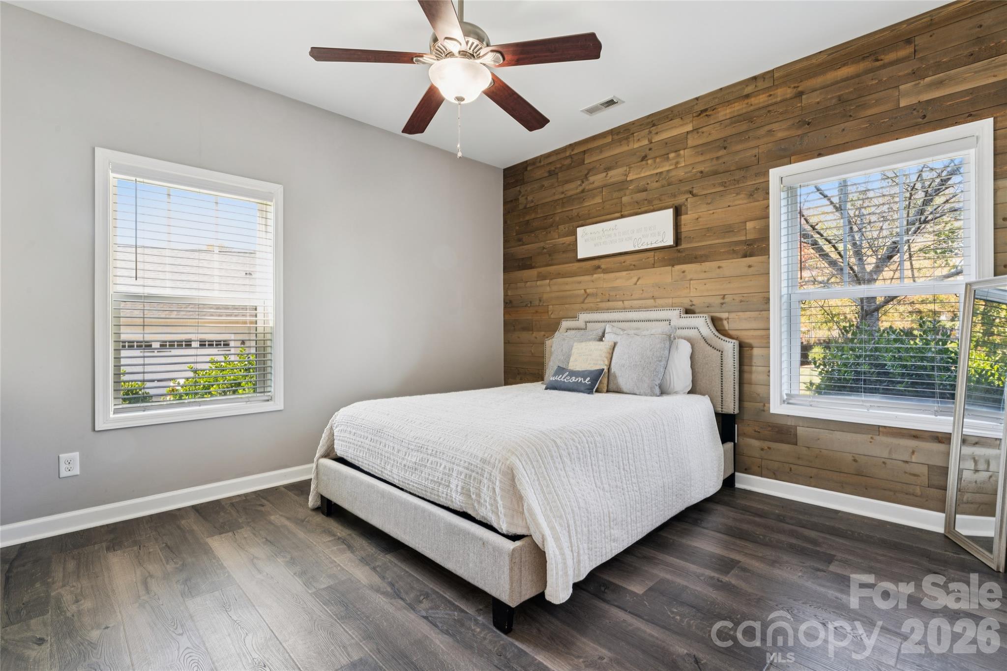 Bedroom on main with custom accent wall. - 2014 Seefin Court, Indian Trail