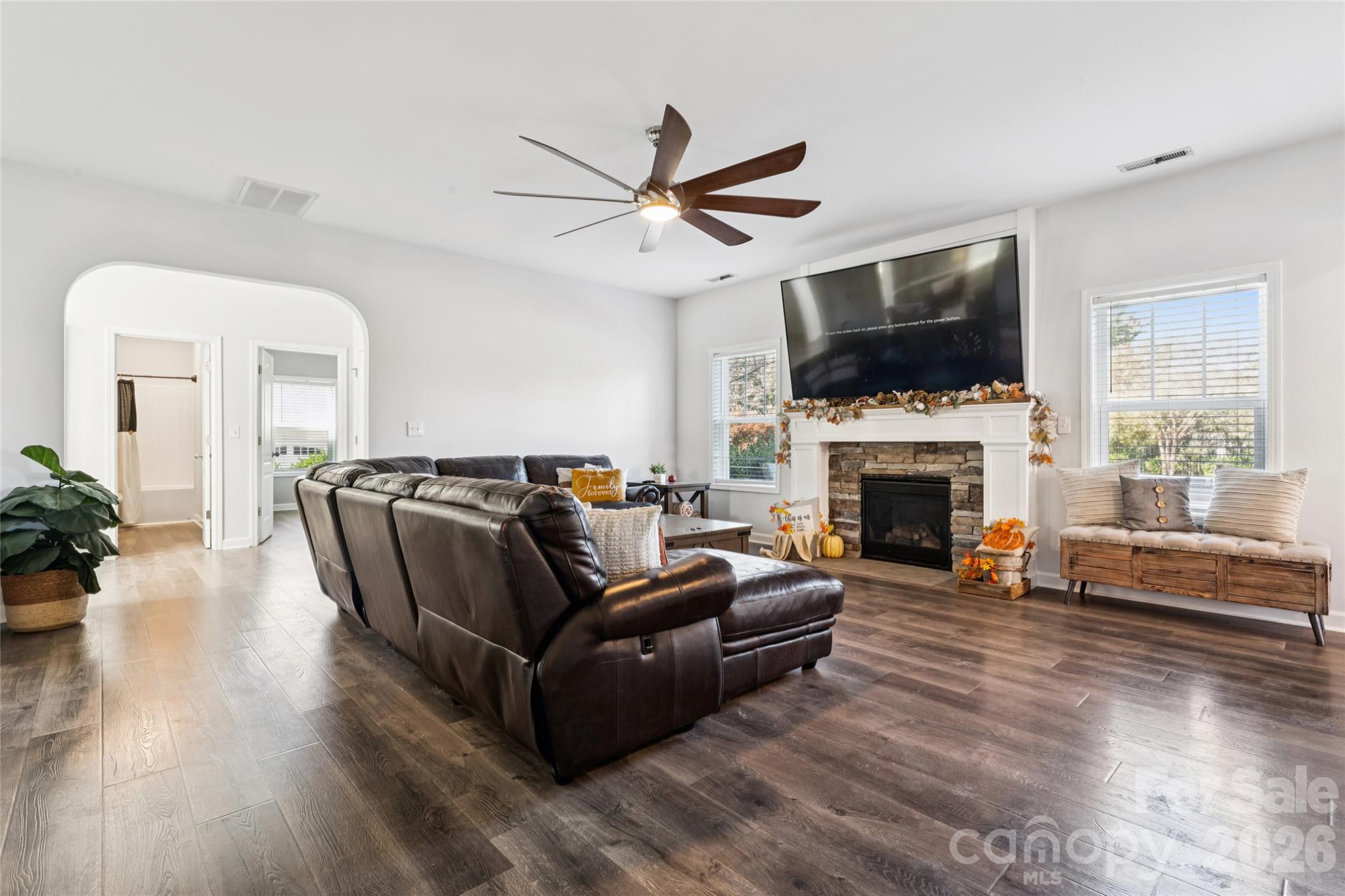 Spacious great room with gas fireplace and ceiling fan. Great for large gatherings, kitchen and sitting room/formal dining within eyeshot - 2014 Seefin Court, Indian Trail