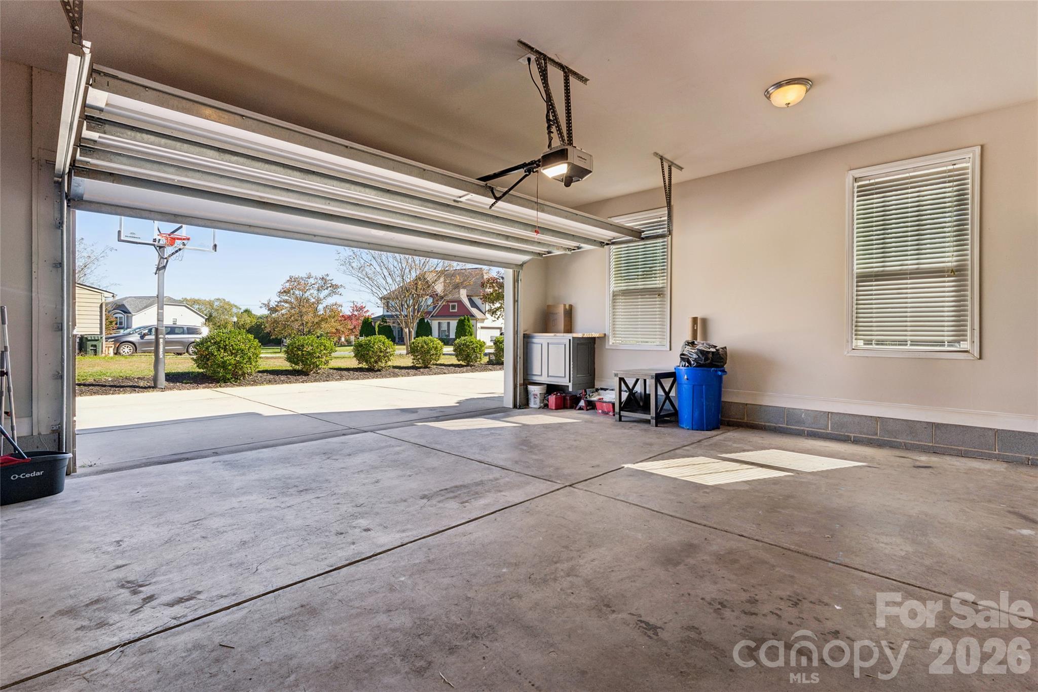 Oversized 2-car garage with built-in shelving. Plenty of space for a workshop - 2014 Seefin Court, Indian Trail