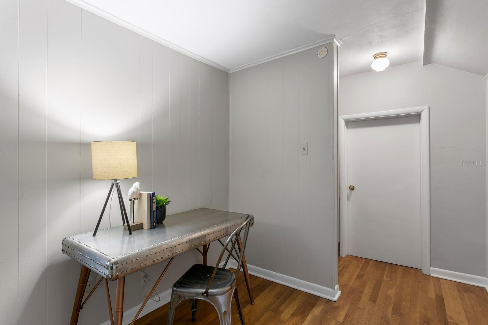 Upstairs Bonus room with the attic door, water heater is right there. Easy access. - 2930 W BAYSHORE CT, TAMPA