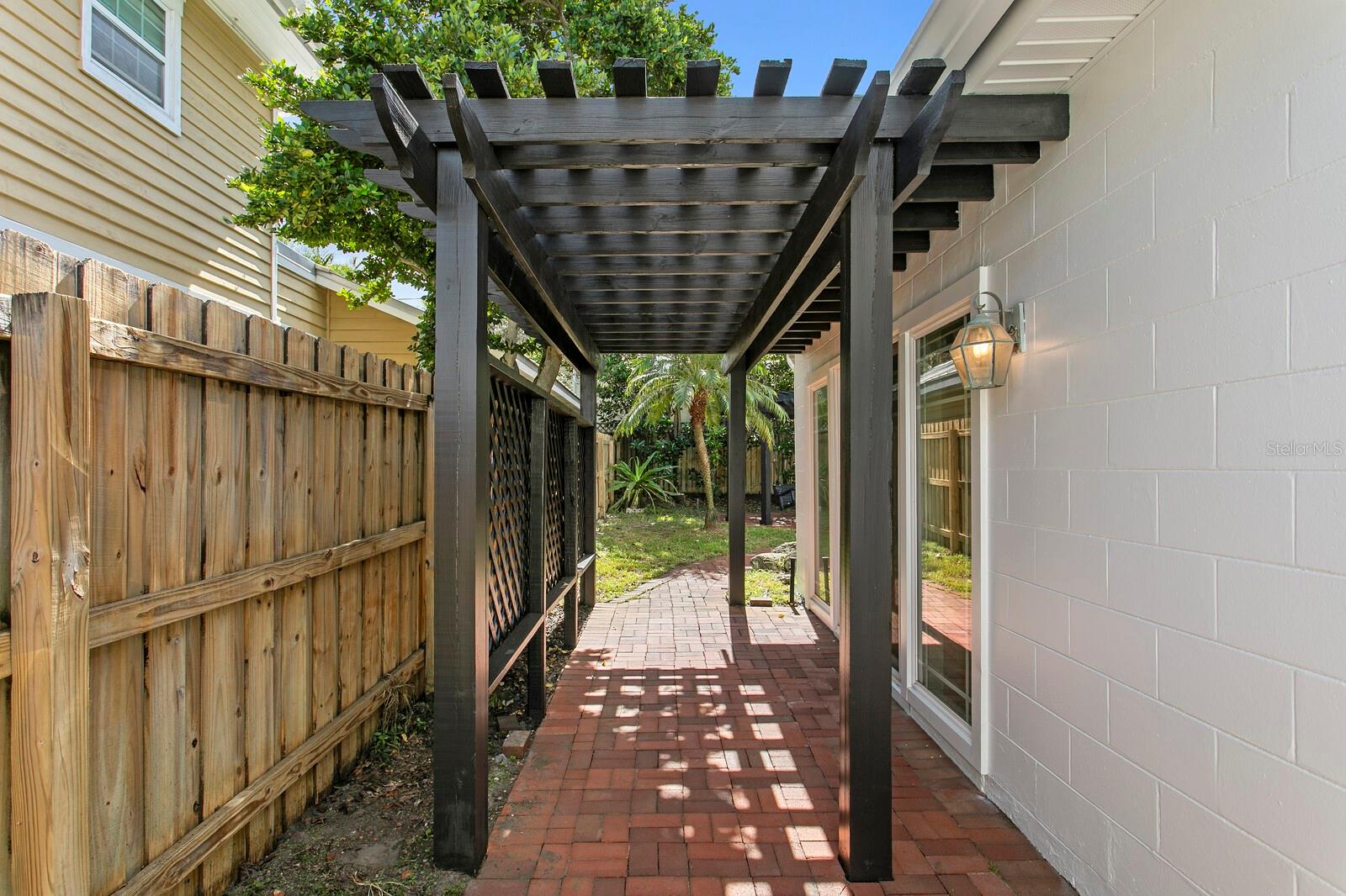 Outside the bonus room. Great for hammock to relax. - 2930 W BAYSHORE CT, TAMPA