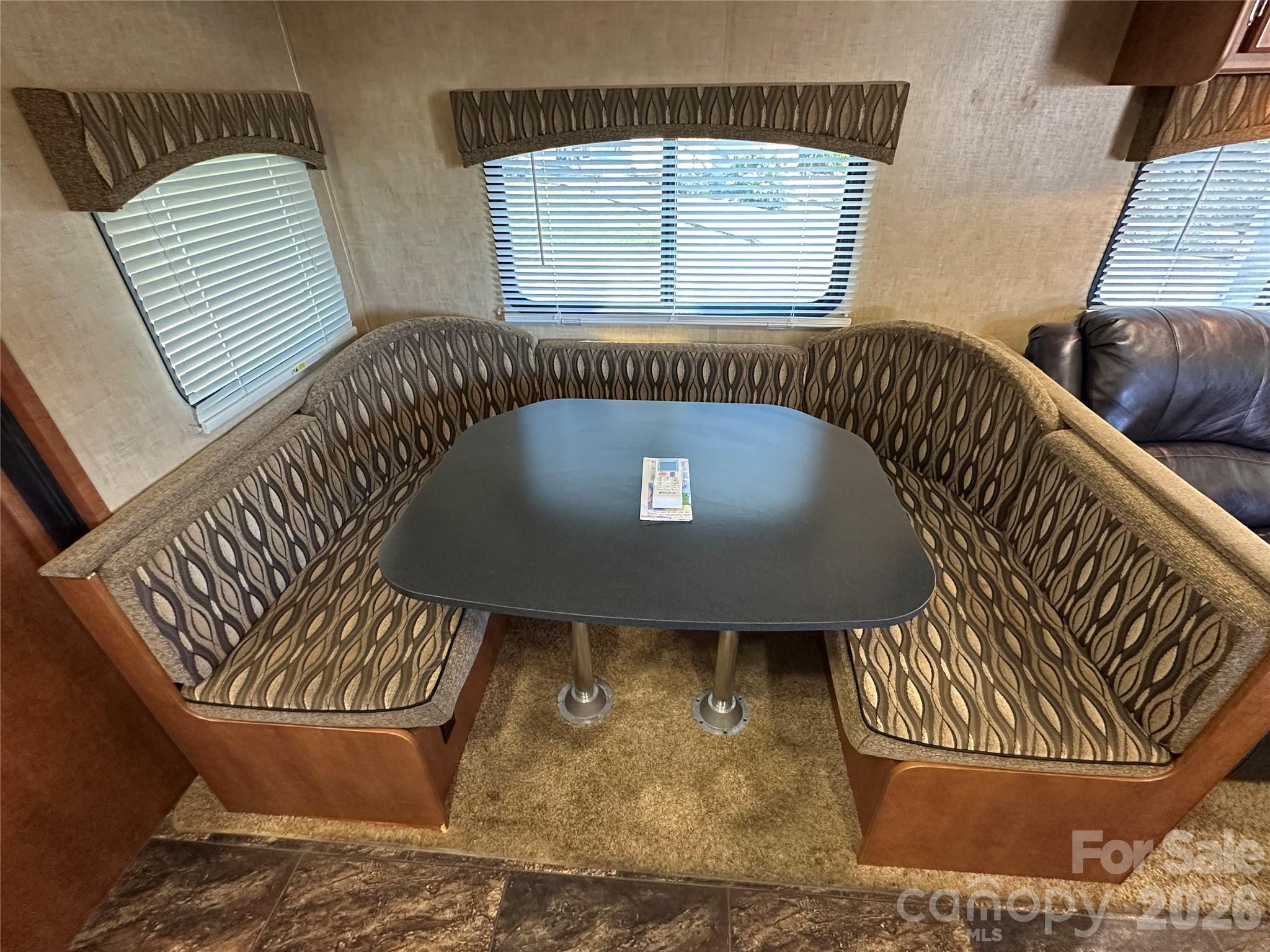 Dinette folds down for an additional sleeping area - 155 Grand View Drive, New London