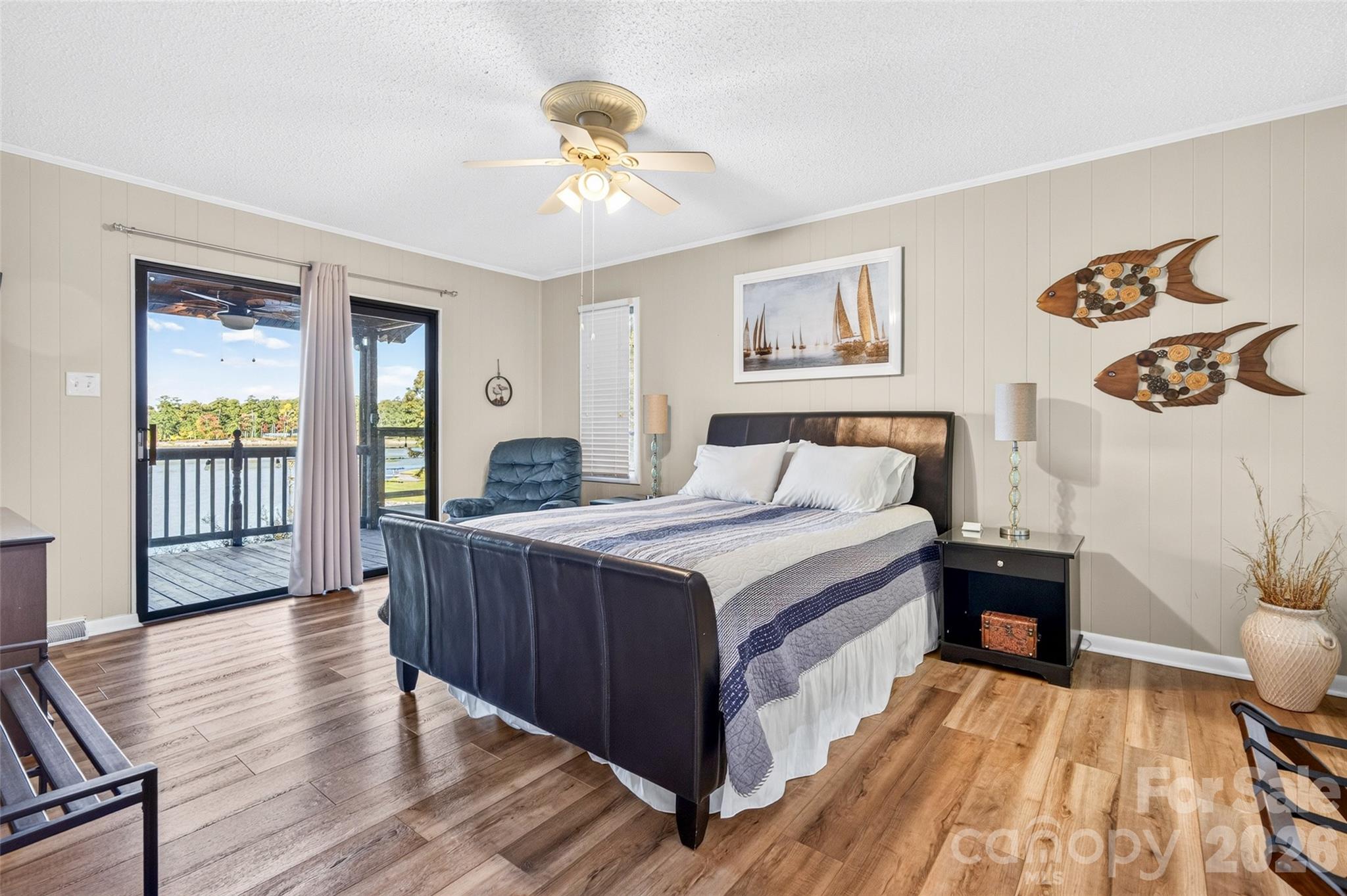 Primary Bedroom with Lake Views walk out to balcony. - 188 Paradise Peninsula Road, Mooresville