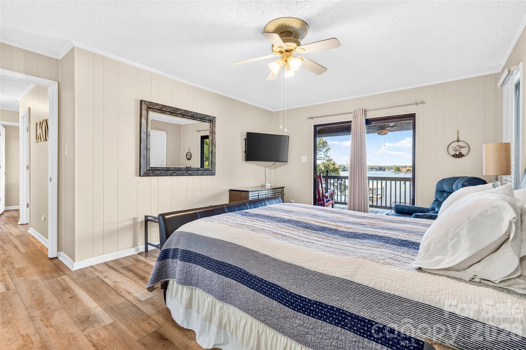 Primary Bedroom with Lake Views walk out to balcony. - 188 Paradise Peninsula Road, Mooresville
