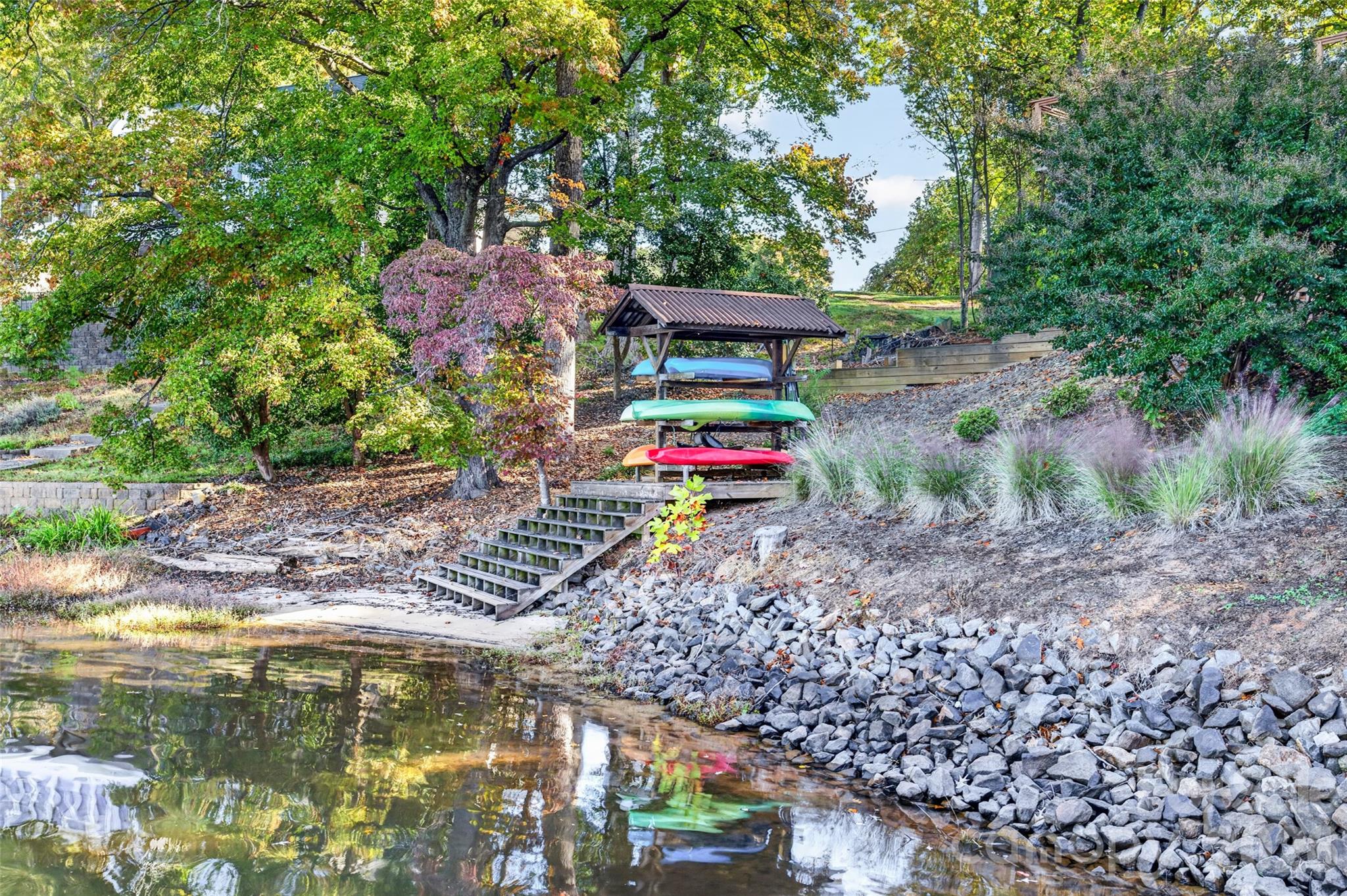 Kayak Storage with Steps down into the lake to launch - 188 Paradise Peninsula Road, Mooresville