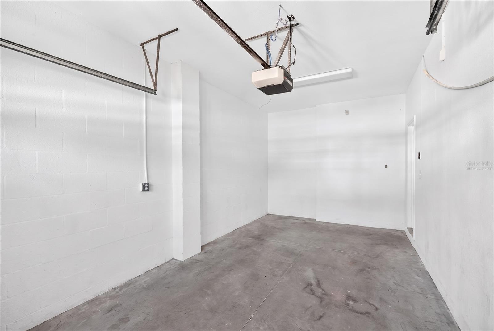 One car garage Virtually Staged - 1257 JONAH DR, NORTH PORT
